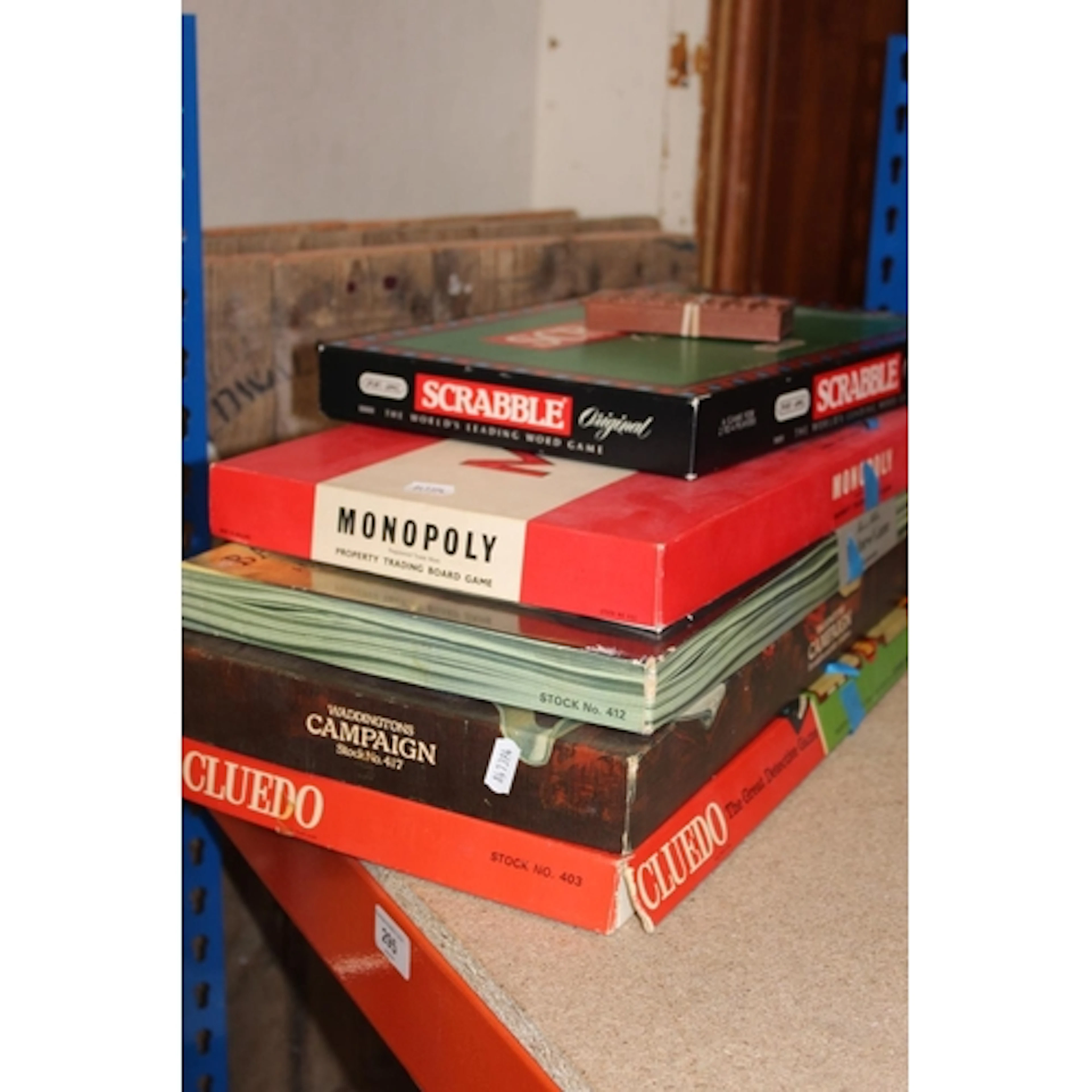 Vintage board games including Monopoly, Cluedo, Scrabble.