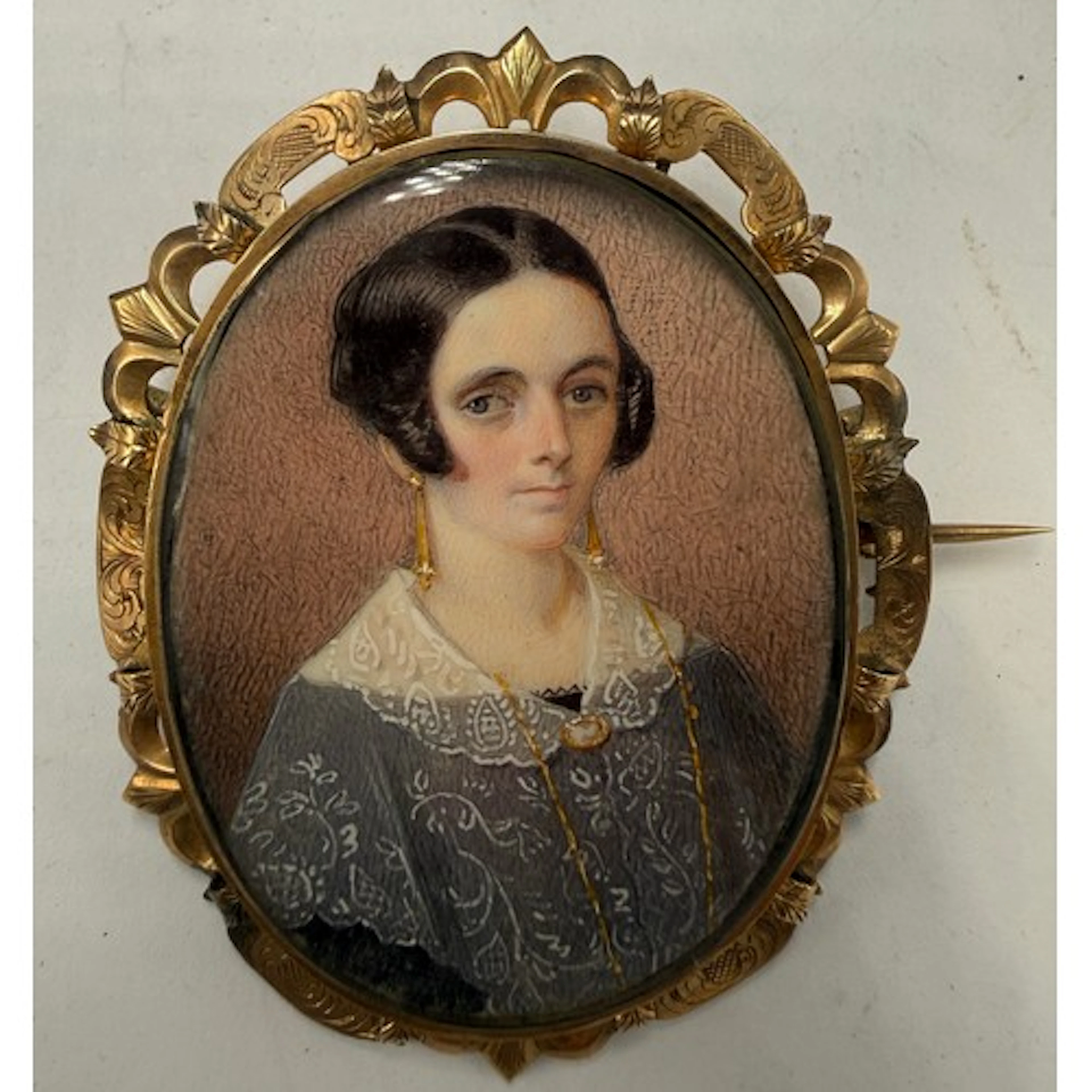 An ivory portrait miniature of a lady, Mrs Salting, in a pie...