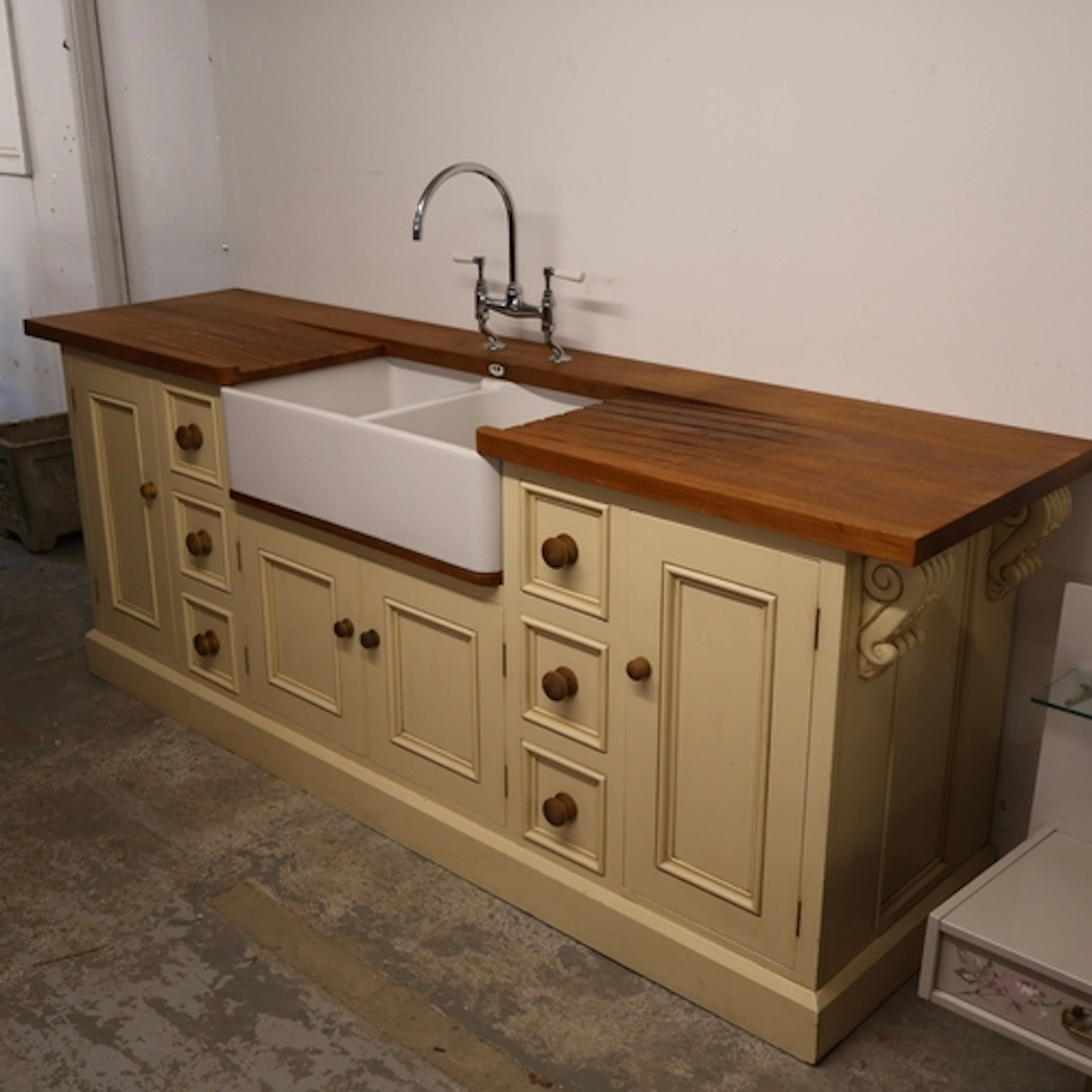 A large contemporary Levick Jorgensen teak topped kitchen ca...