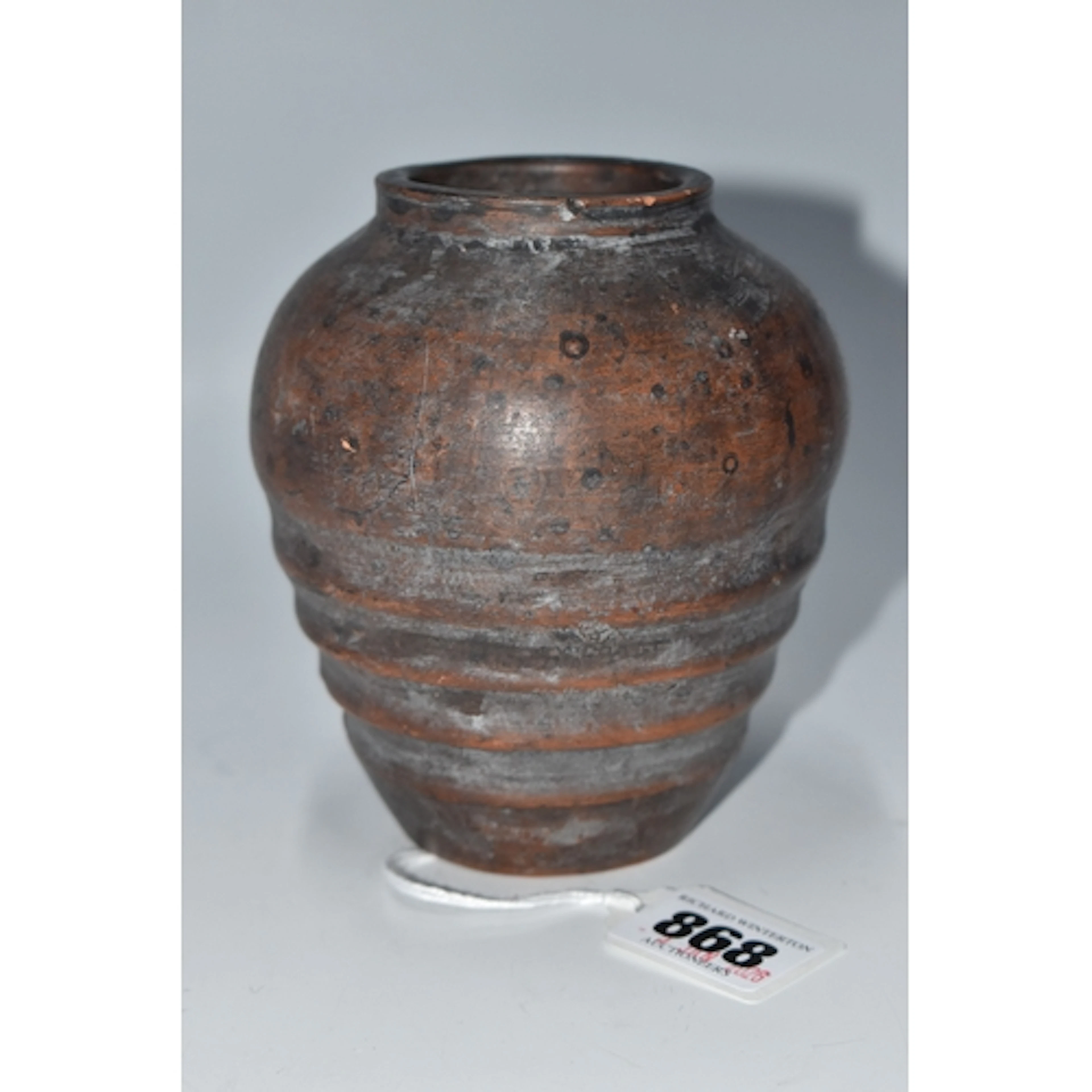 A LATE NINETEENTH/EARLY TWENTIETH CENTURY TERRACOTTA VASE, b...