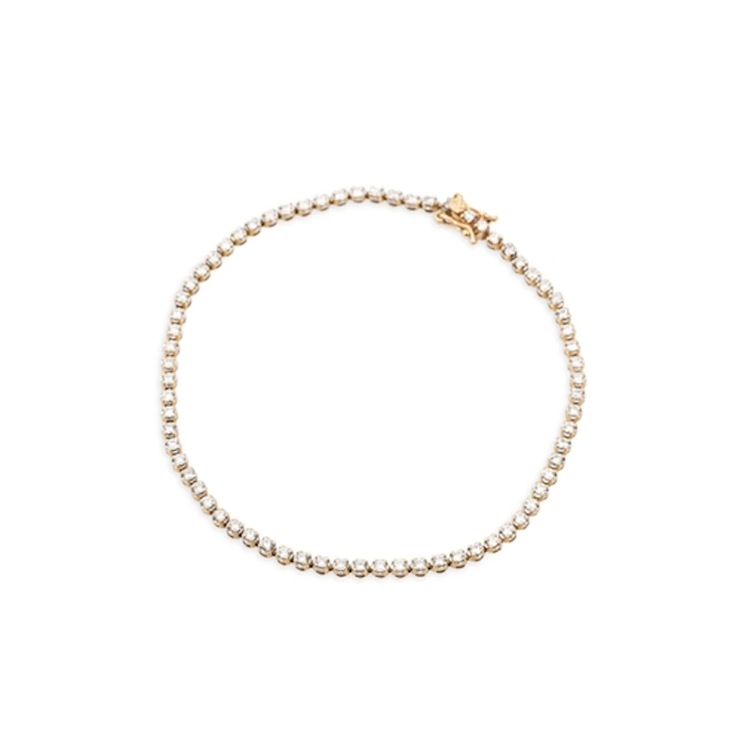 A DIAMOND LINE BRACELET, the round cut diamonds mounted in 9...