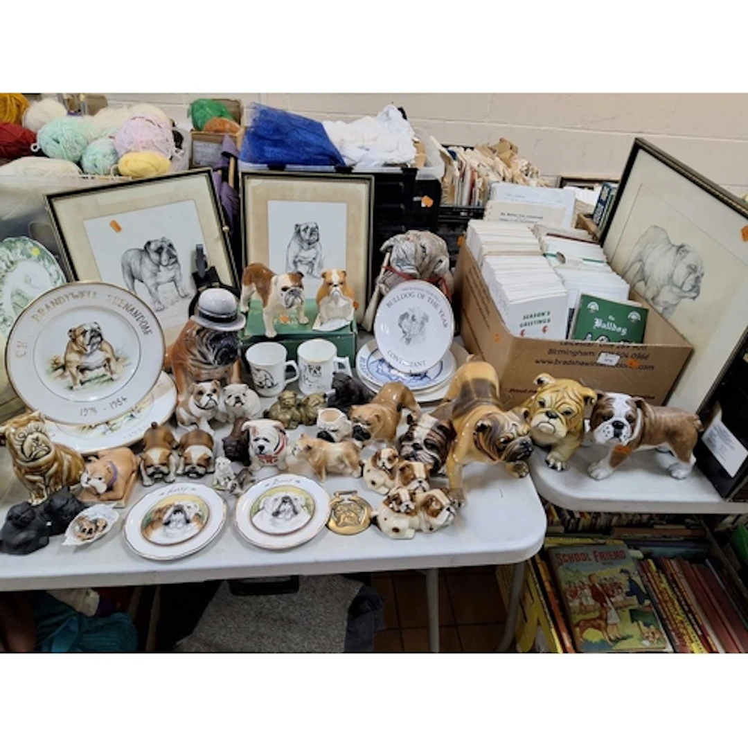 A COLLECTION OF BULLDOG-RELATED ITEMS to include a box conta...