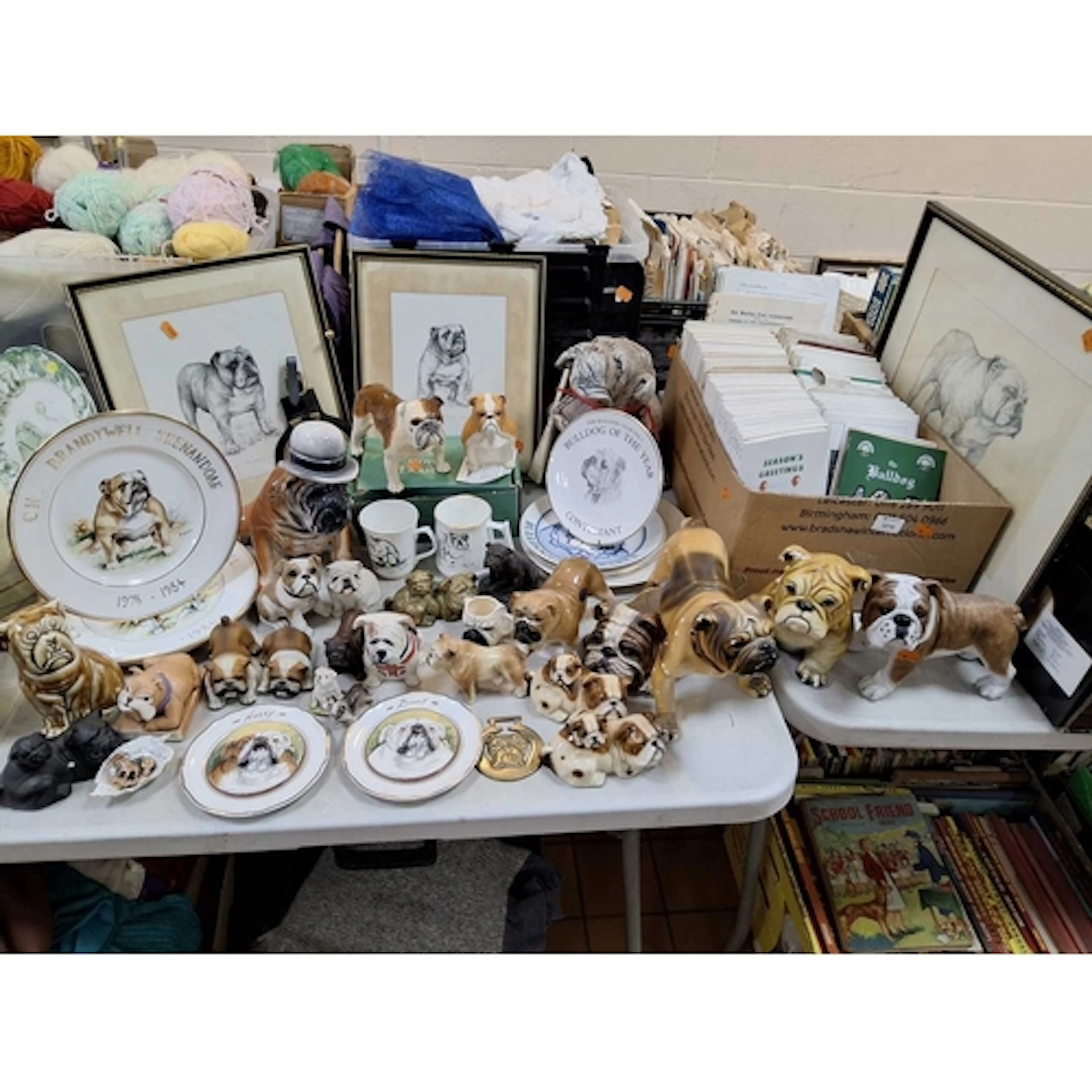 A COLLECTION OF BULLDOG-RELATED ITEMS to include a box conta...