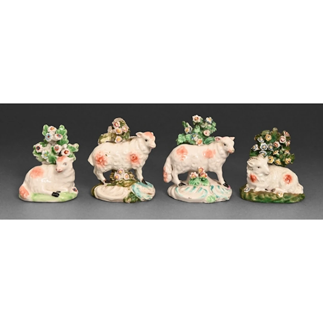Four Derby models of sheep, c1780, before bocage, recumbent ...