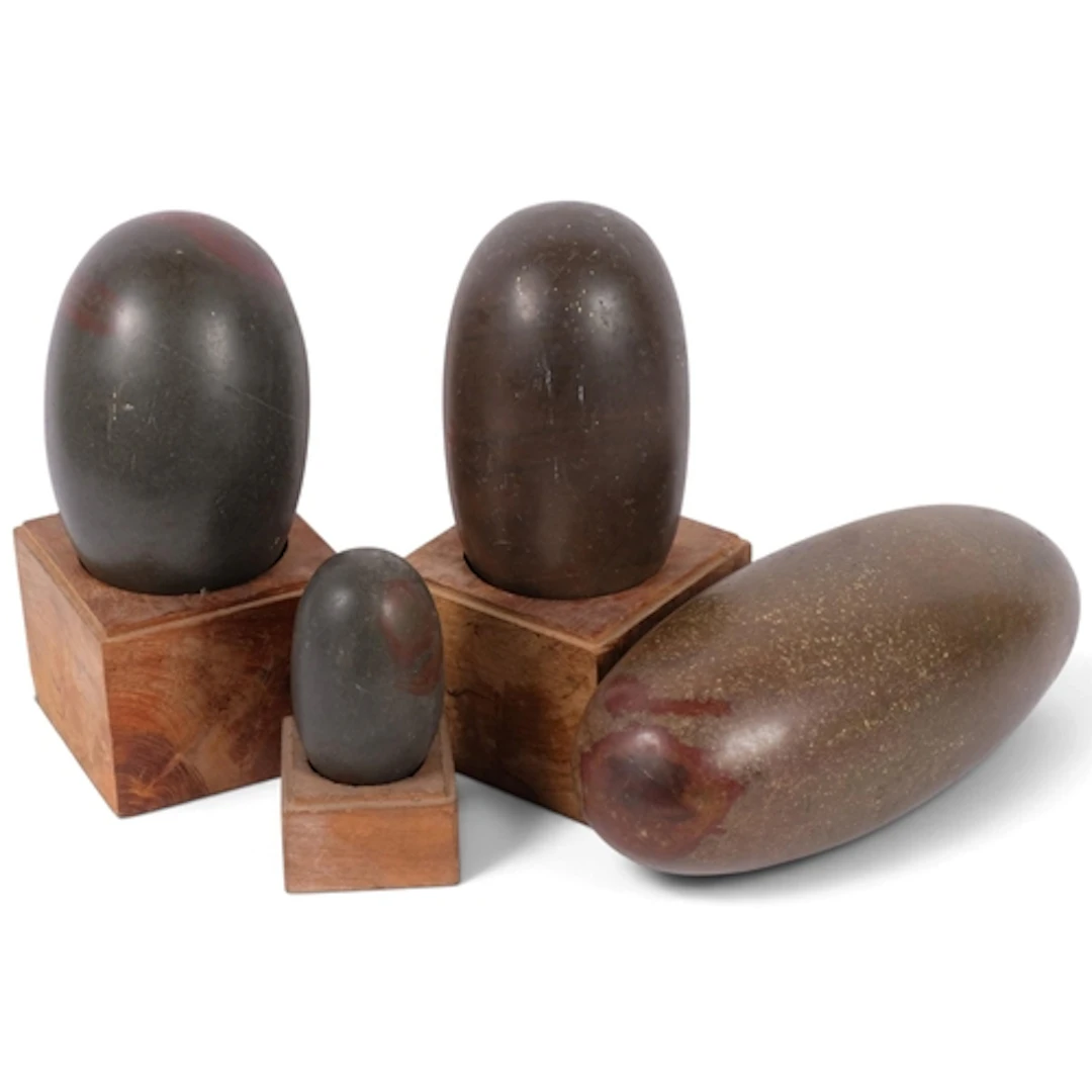 A massive Indian Shiva Lingam stone, ovoid shape, L29cm, tog...