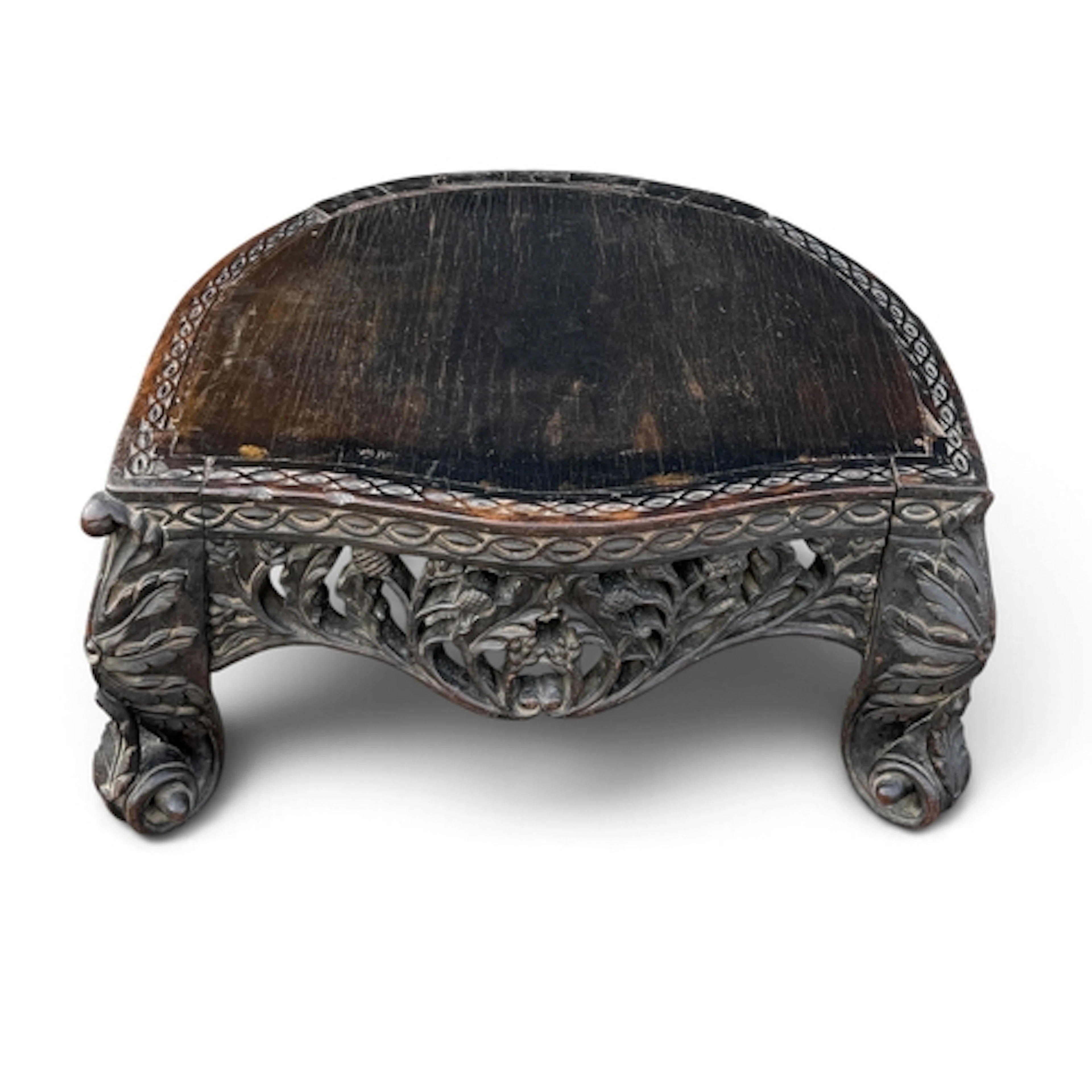 A PROFUSELY CARVED 19TH C BURMESE STOOL 55cm W x 51cm D x 30...