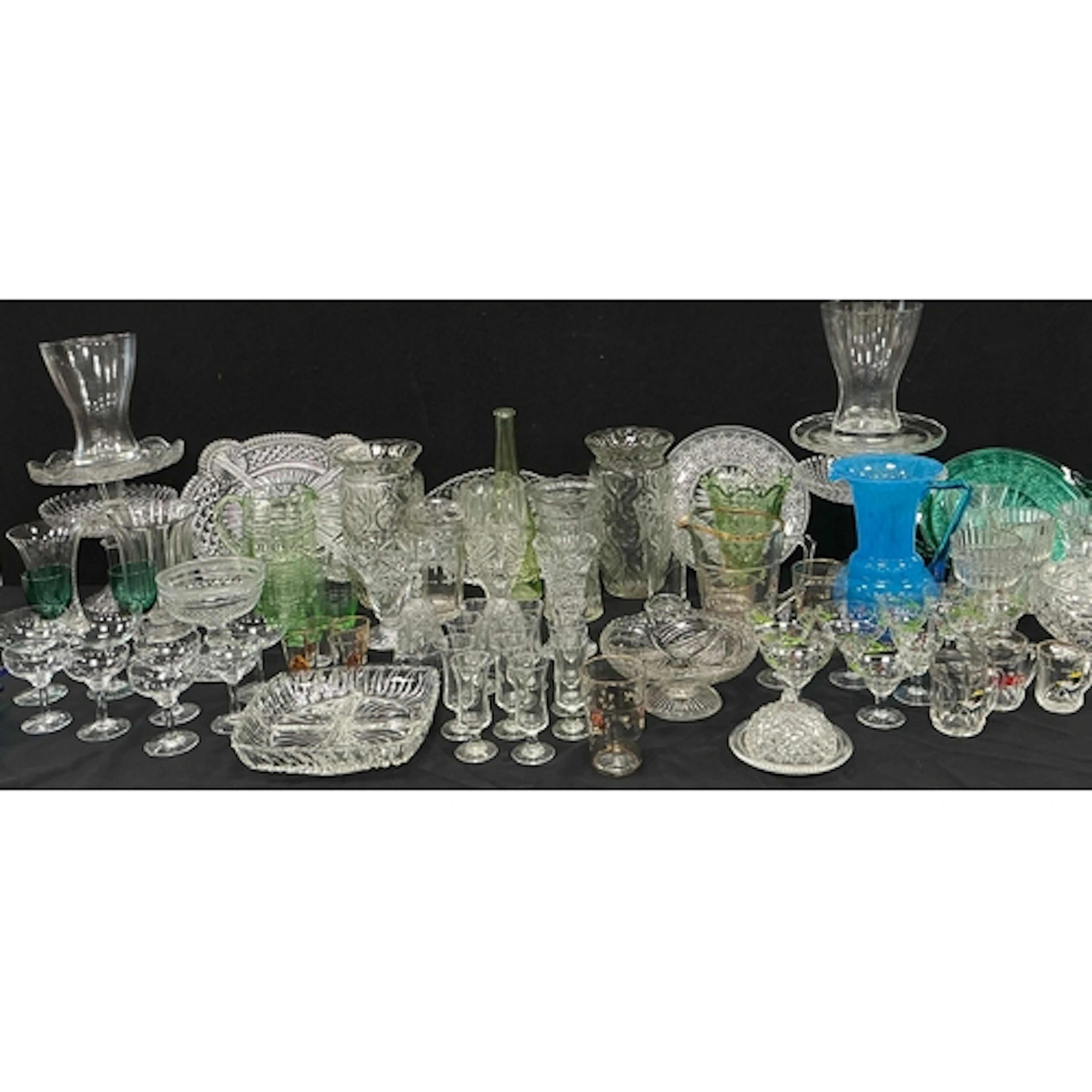 Glassware - a uranium glass cordial jug with four uranium g...