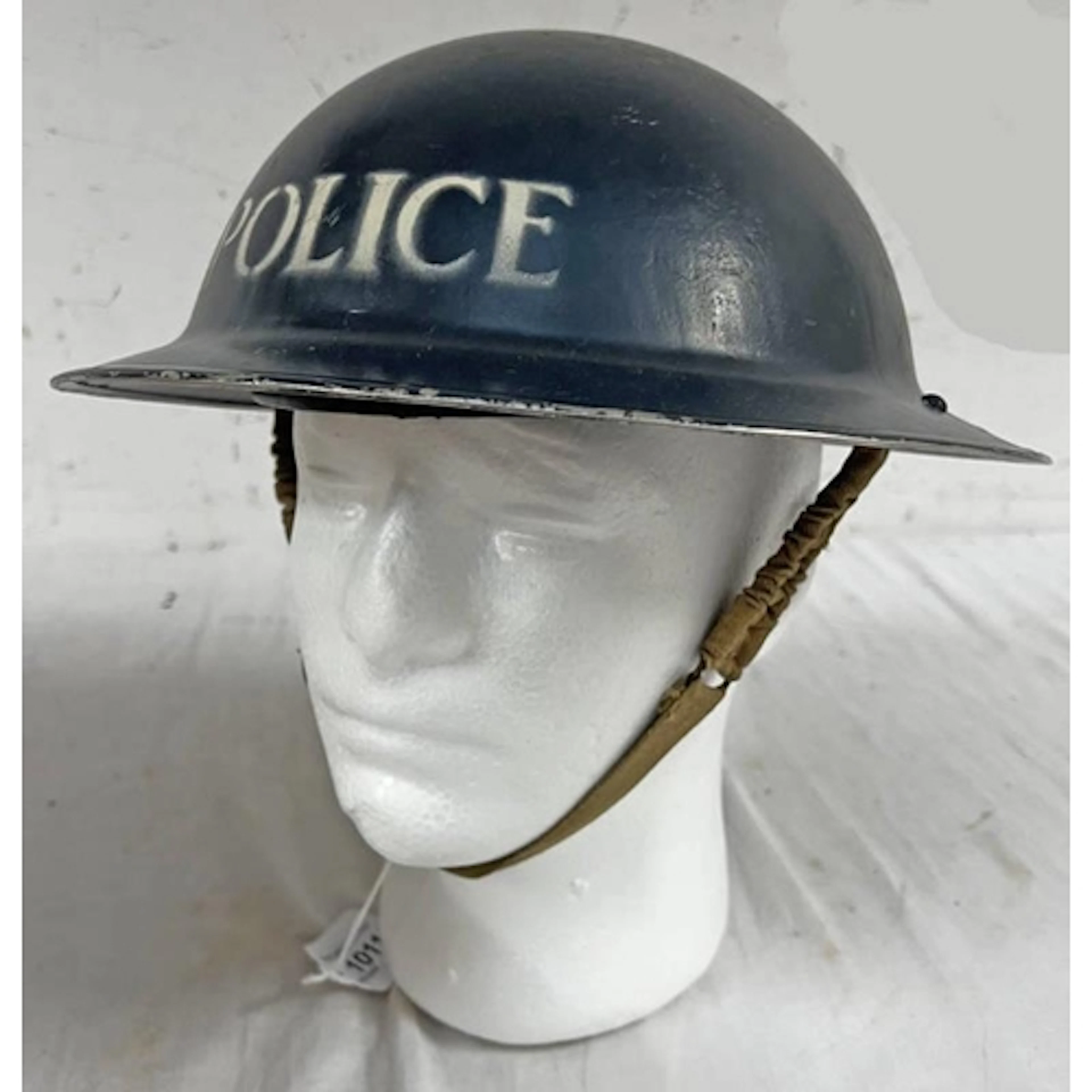 WW2 BRITISH BRODIE HELMET MARKED POLICE TO EXTERIOR AND STAM...