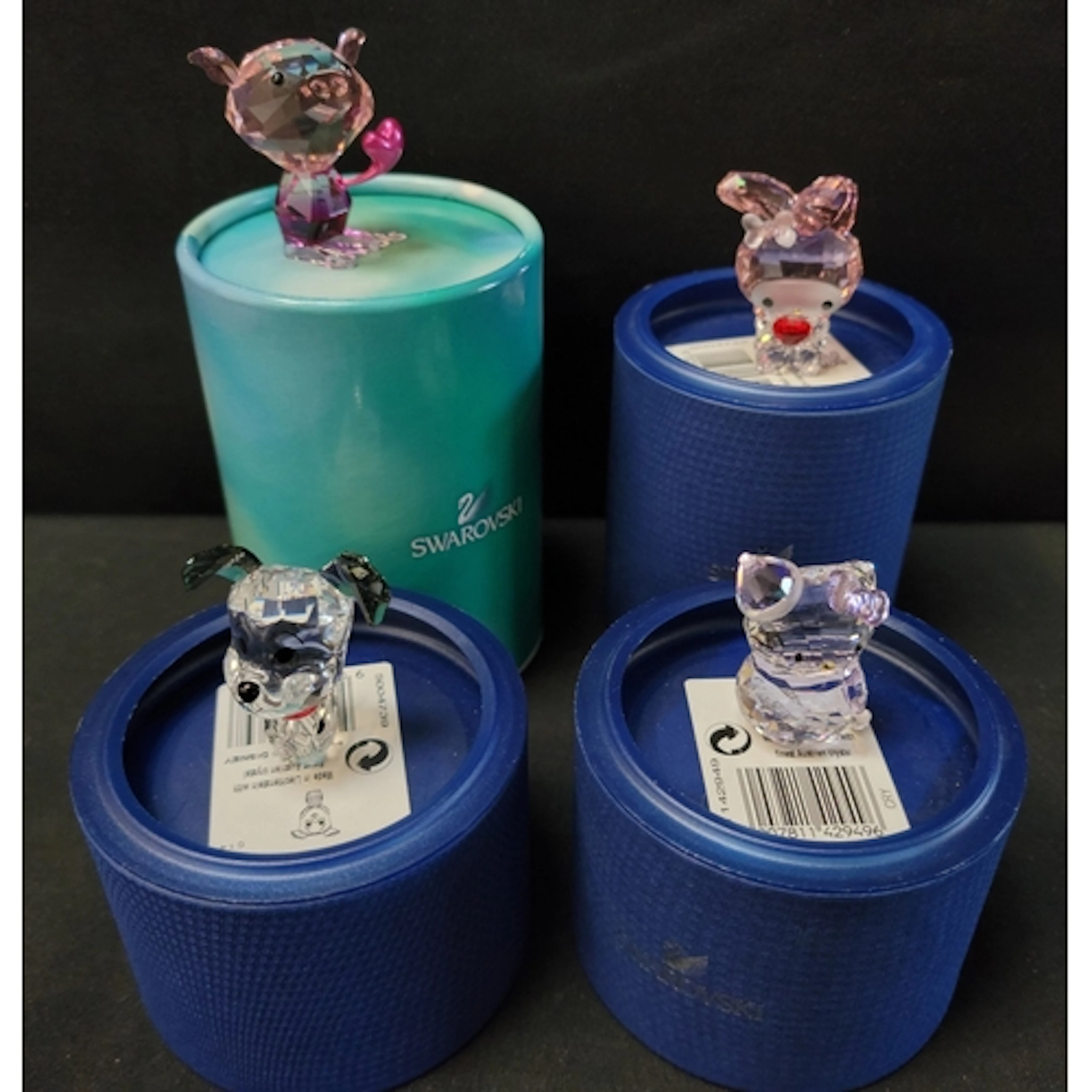 FOUR SWAROVSKI FIGURES comprising 'Lovlots Emoti Love' 11433...