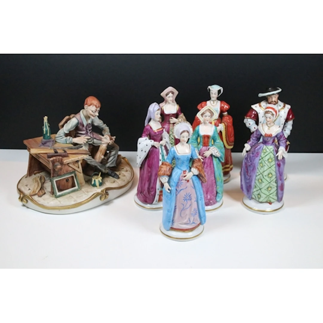 Seven Sitzendorf porcelain figures of Henry VIII and his six...