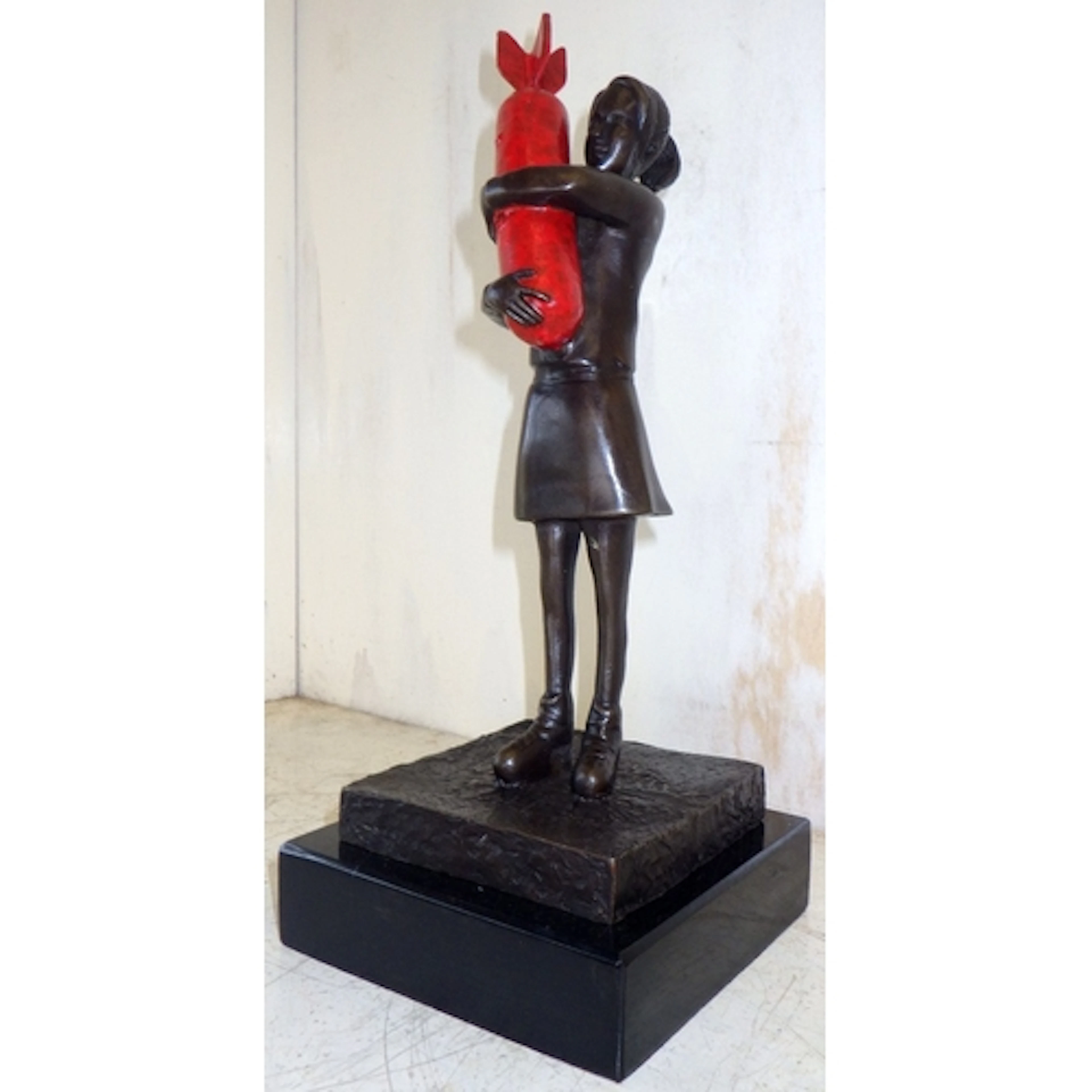 After Banksy bronze Missile Girl sculpture on marble base, 4...
