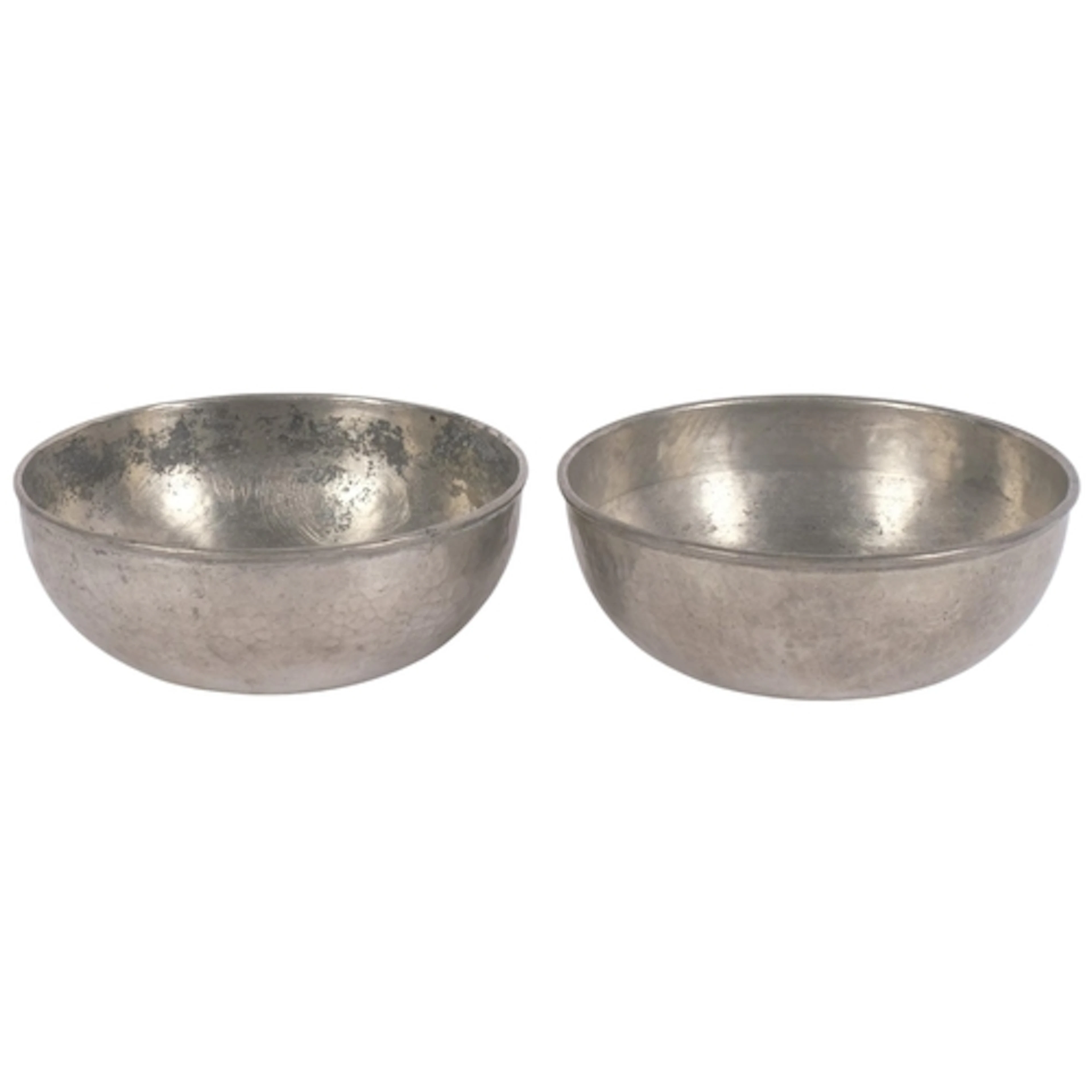 A pair of Tudric for Liberty hand-beaten pewter dishes, diam...