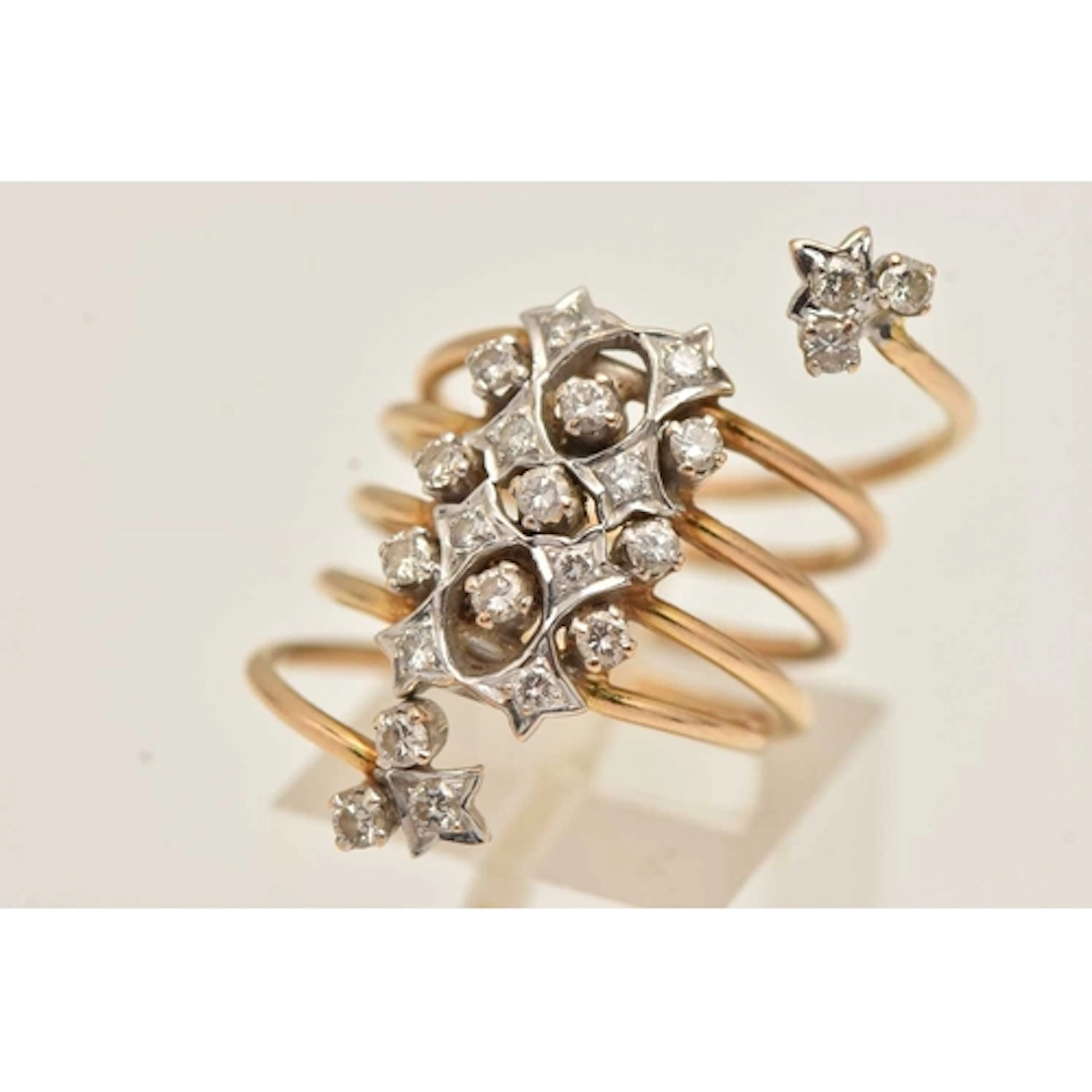 A BI COLOUR DIAMOND DRESS RING, a yellow metal twist ring wi...