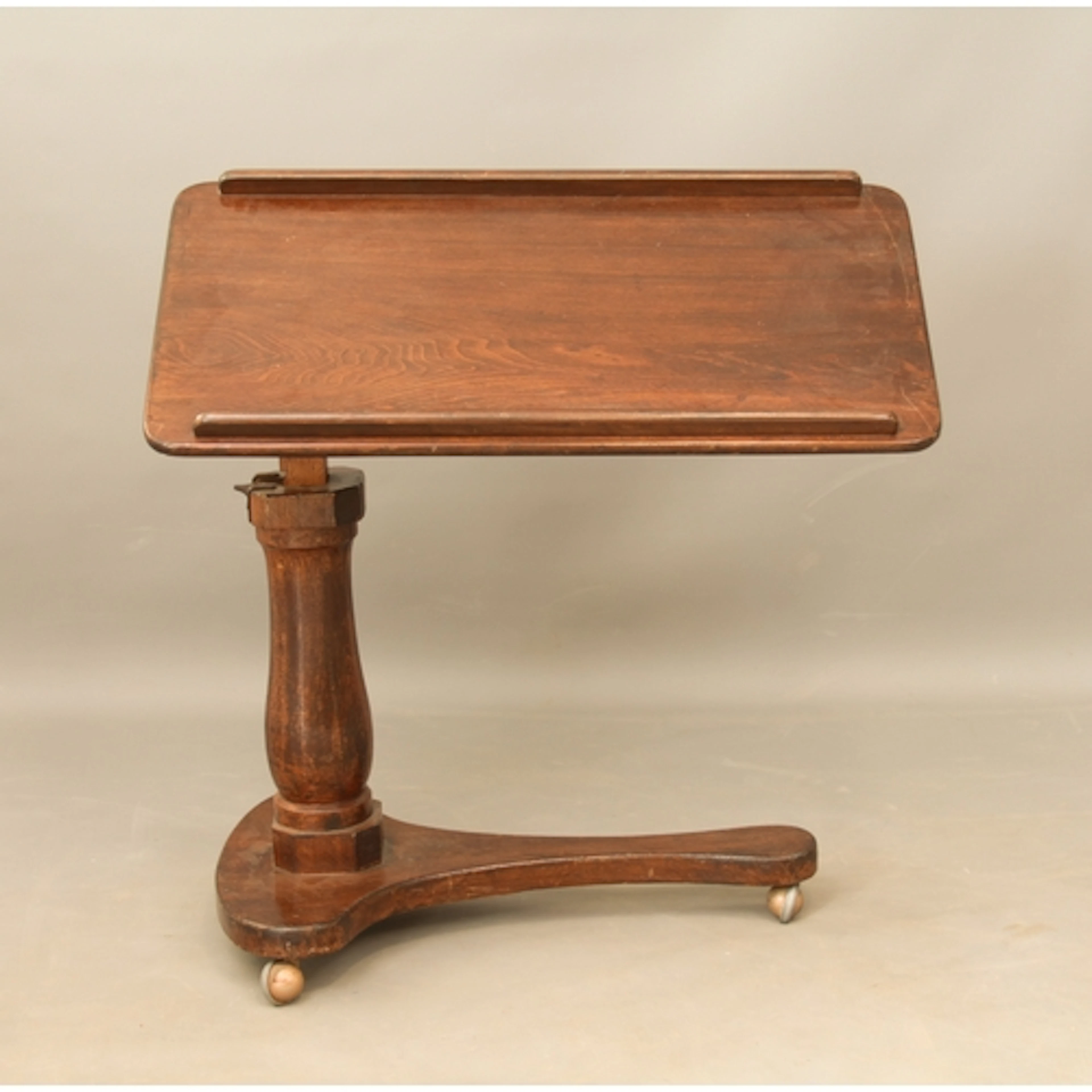 A Carters Patent (London) oak lectern or reading table - 192...