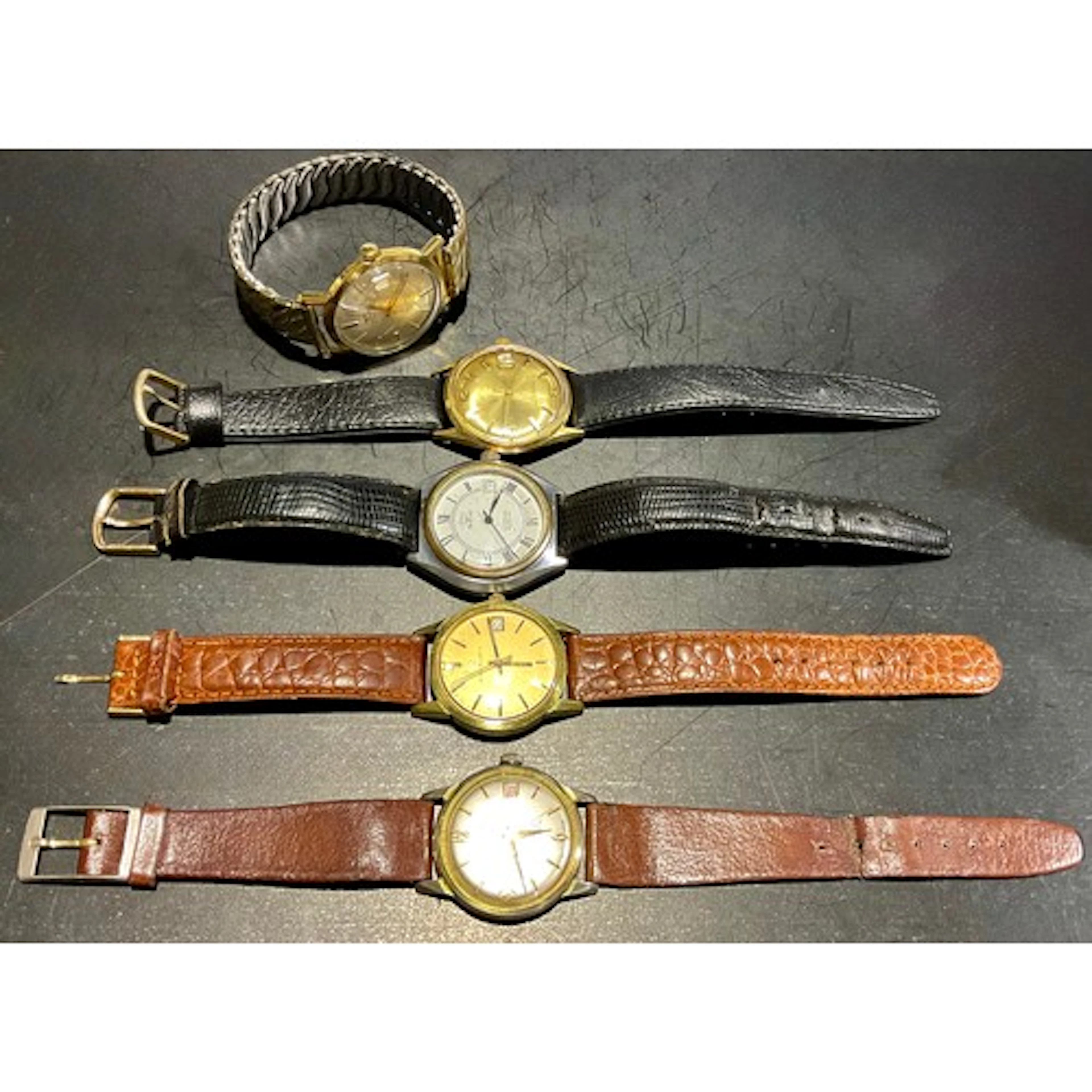 Watches - a gentleman’s day/date Mondaine wristwatch, gold b...