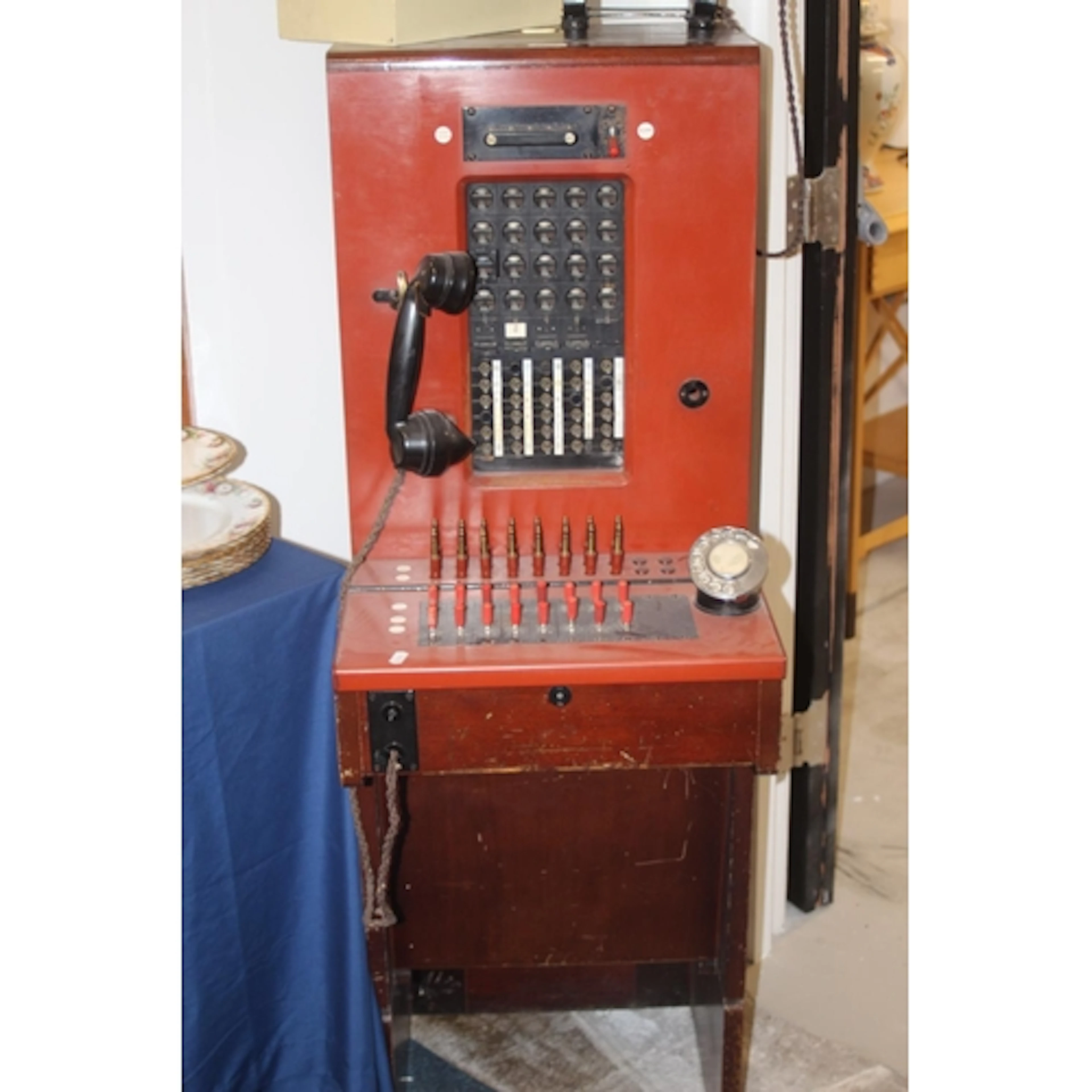 Vintage telephone switchboard with plaque 'SW BD CB 675 5+20...