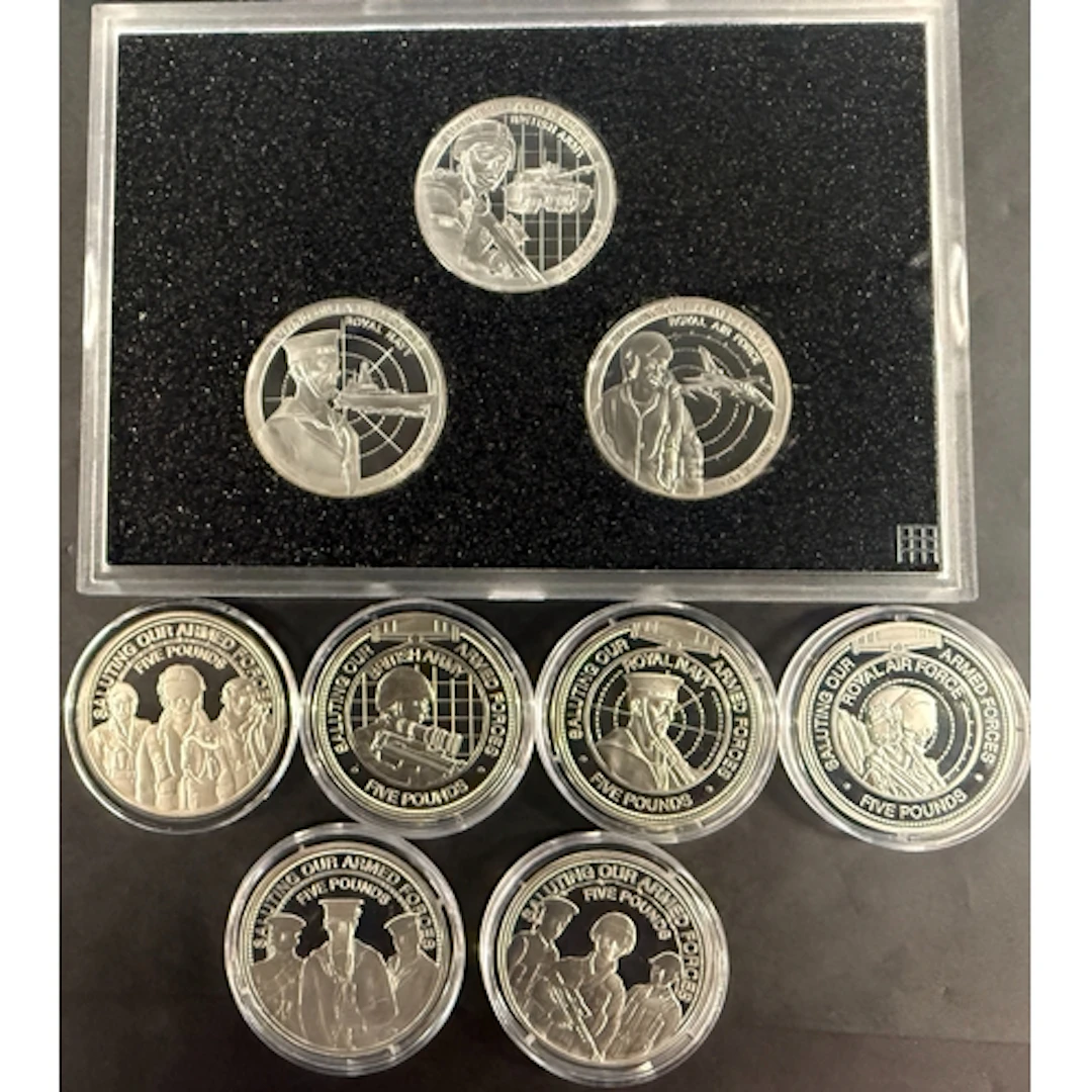 A group of nine Guernsey A Tribute to the Armed Services sil...