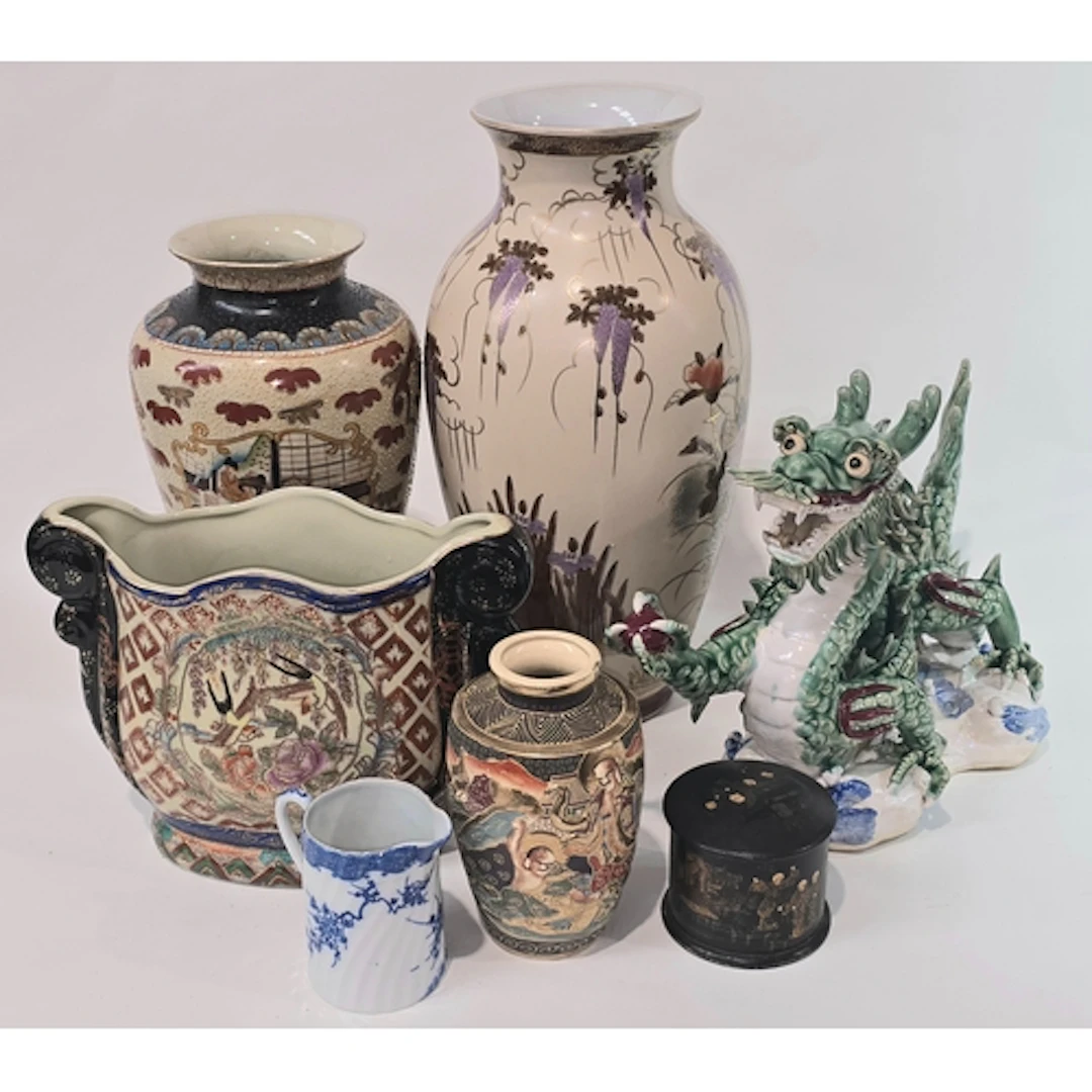 A collection of Oriental ceramics to include a large green m...