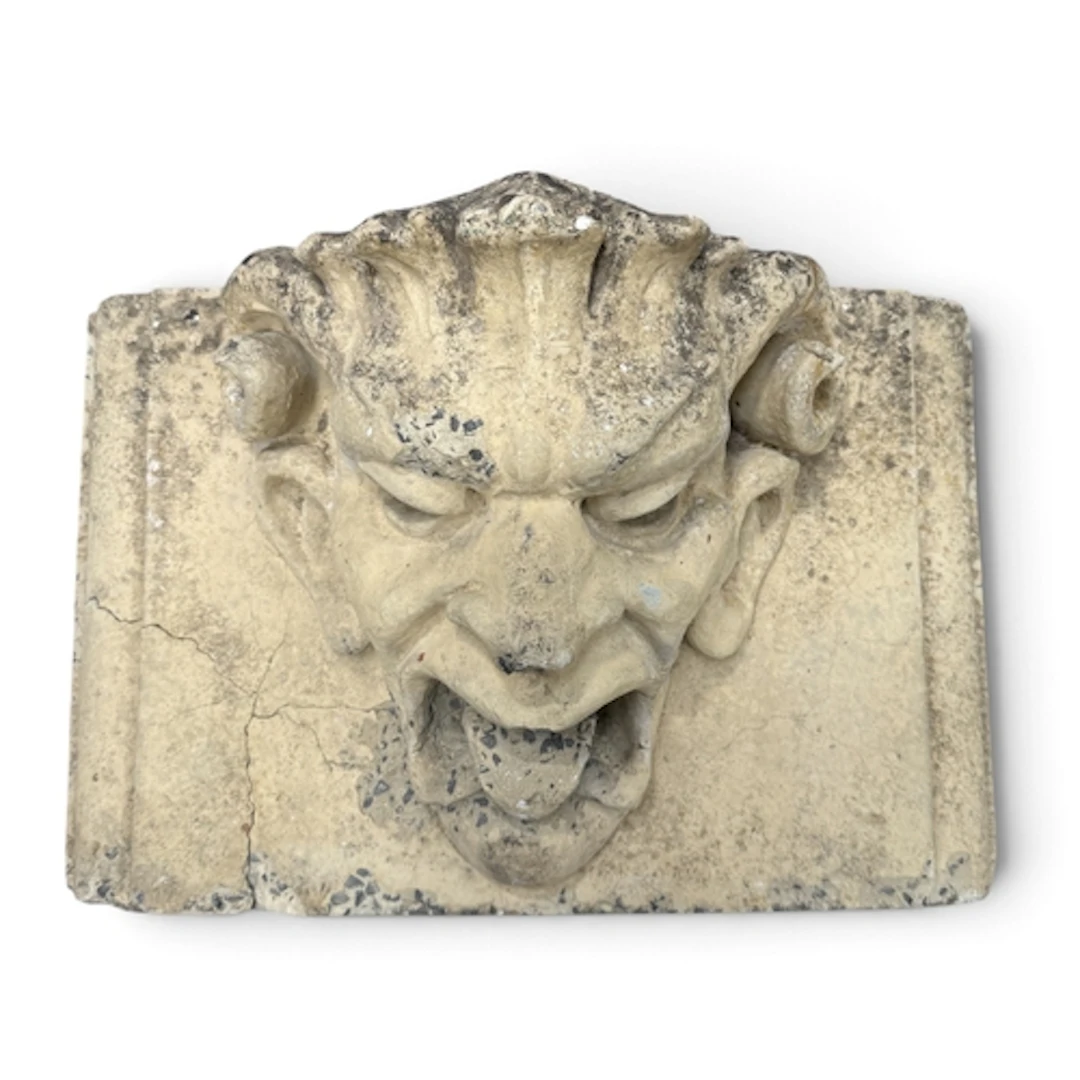 A MID VICTORIAN STONE ARCHITECTURAL FRAGMENT CARVED IN THE F...