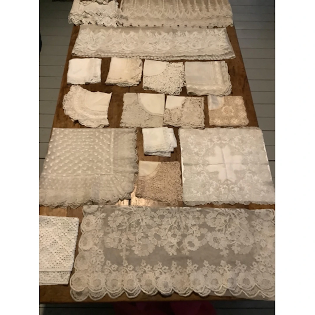 A collection 19th and early 20th century lace hankies, inclu...