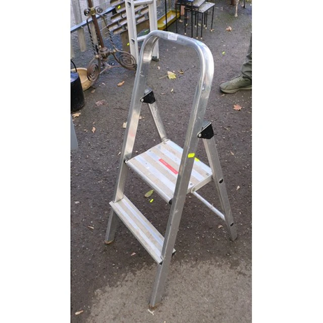 Folding aluminium two-step ladder.