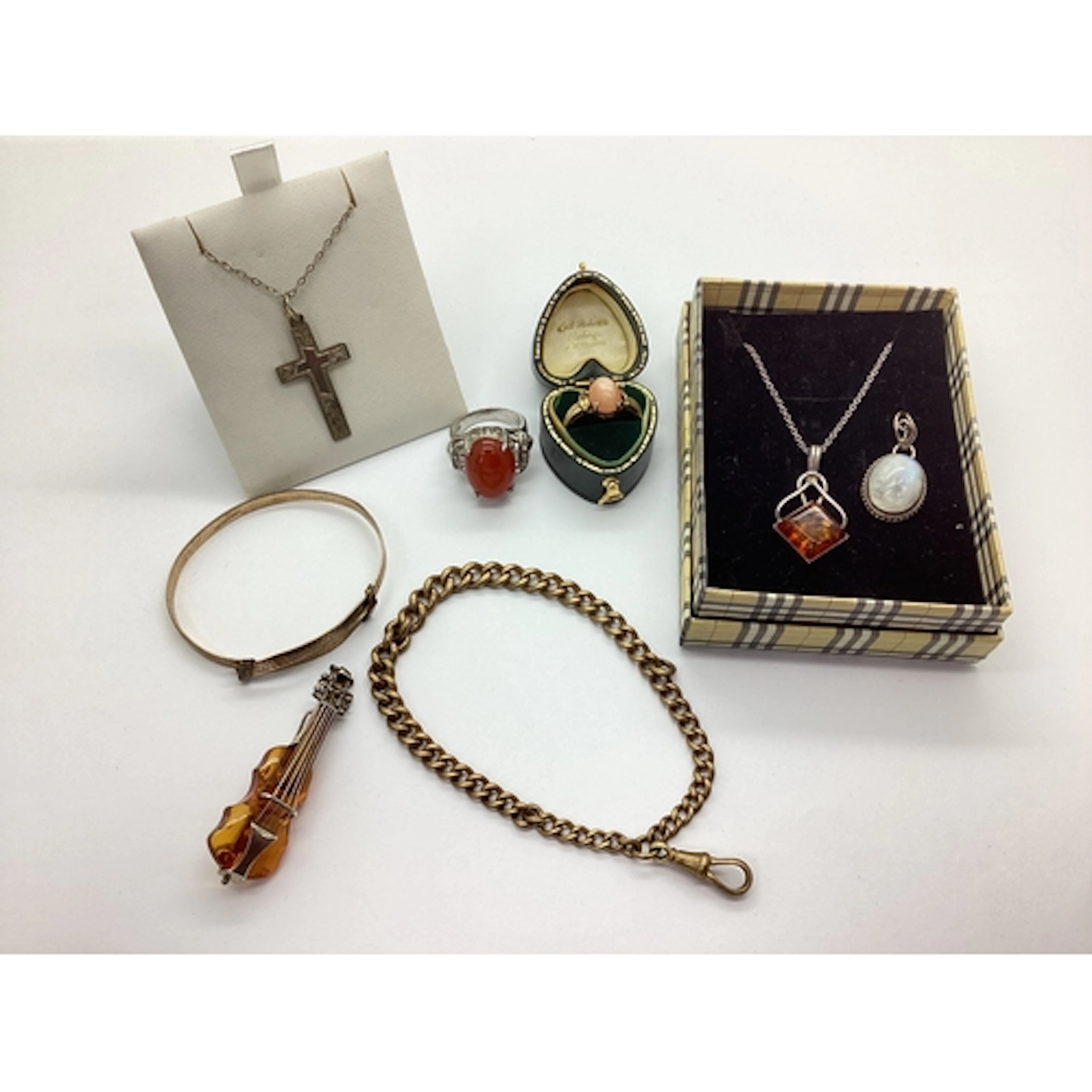 A Novelty Amber Coloured Chello Style Brooch, a similar open...