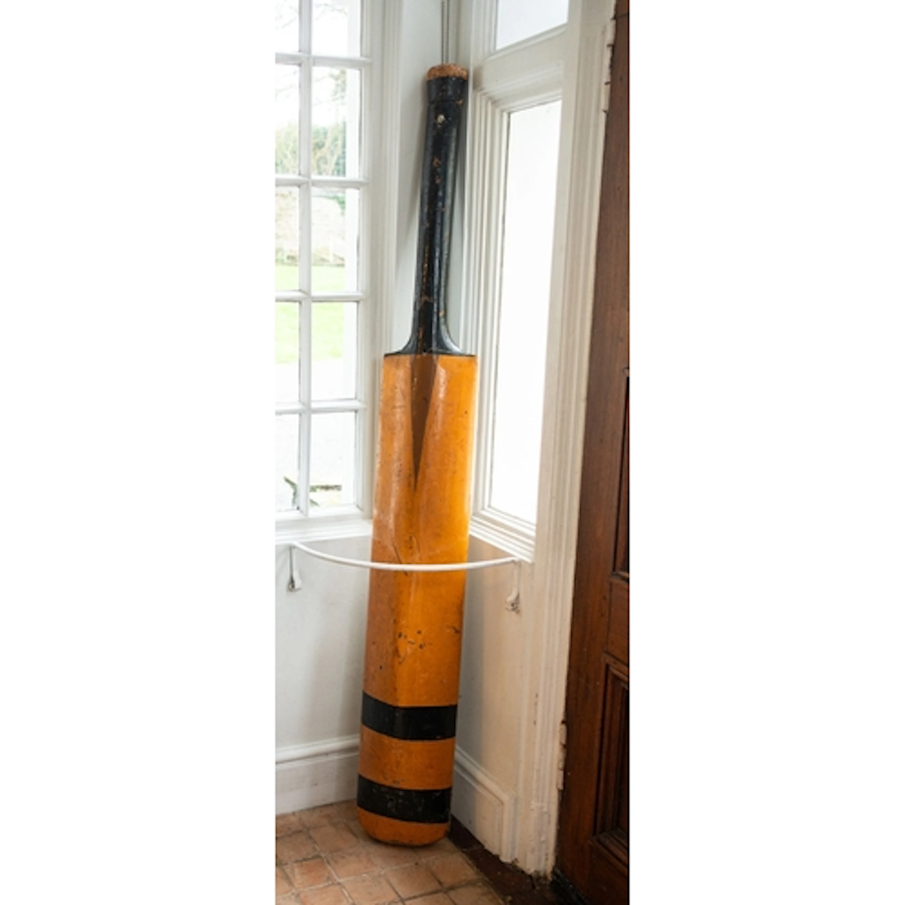 A late 19th/early 20th century oversize cricket bat advertis...