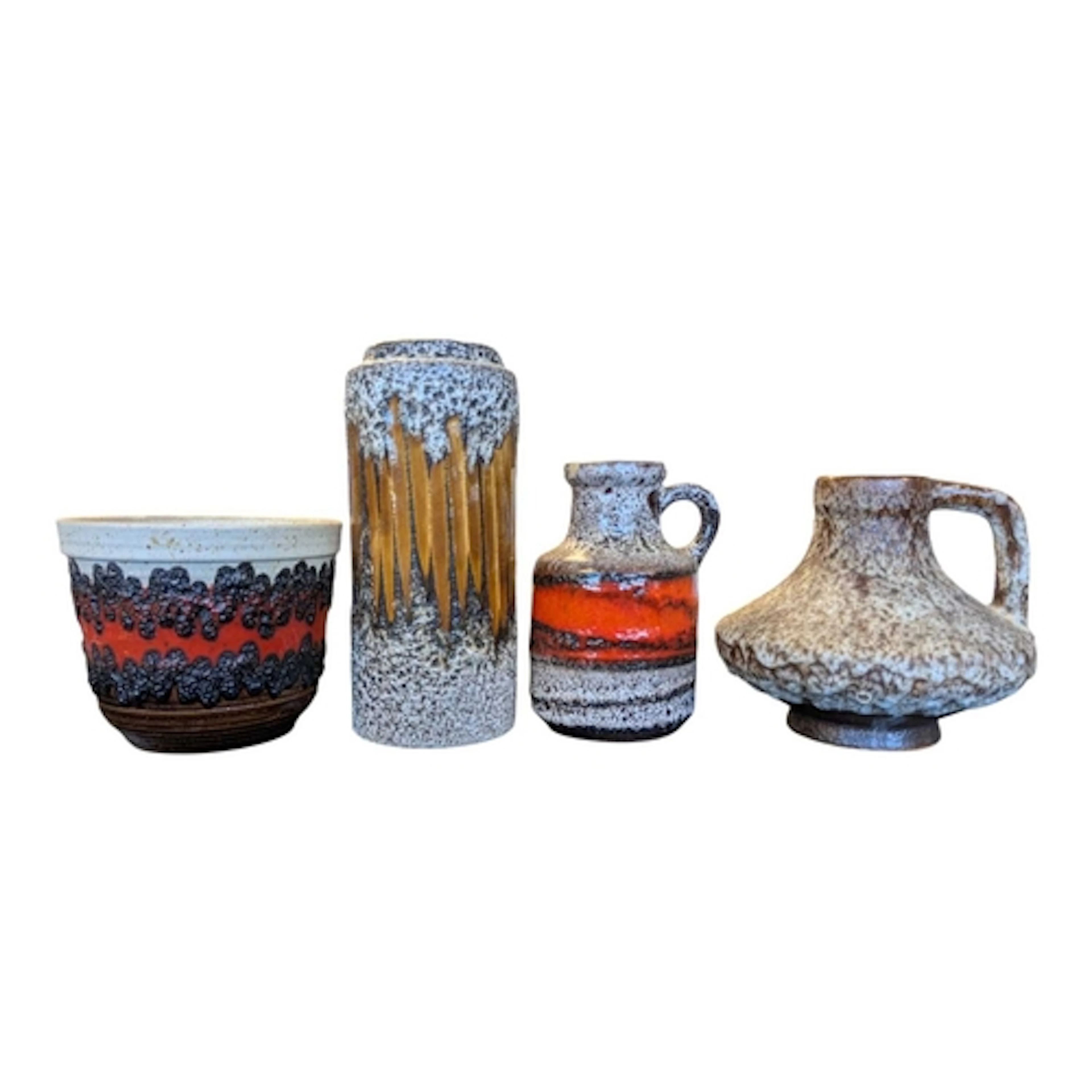 Four late 20th century West German fat lava pottery. To incl...