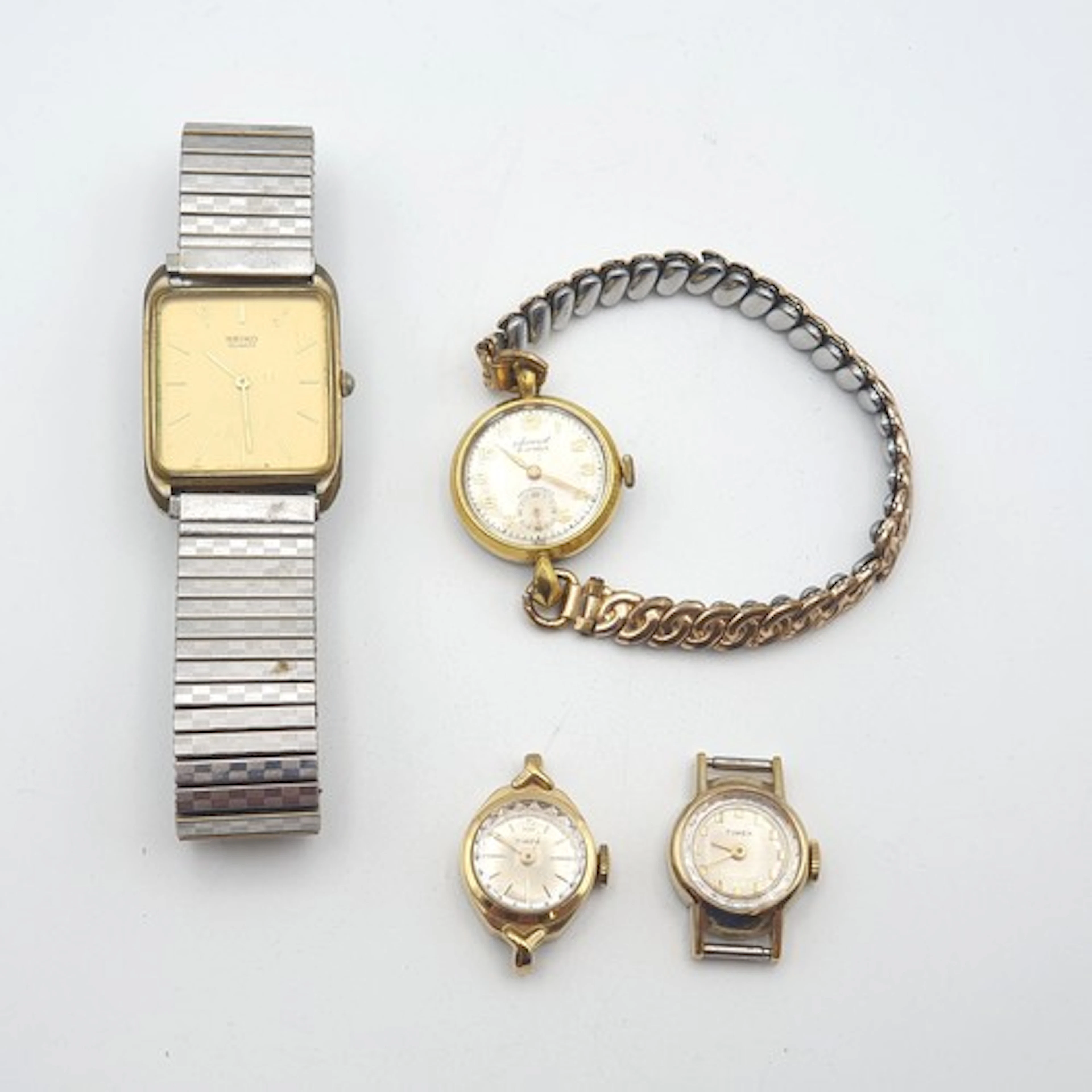 A Gent's Seiko Wristwatch with rectangular dial, and three l...