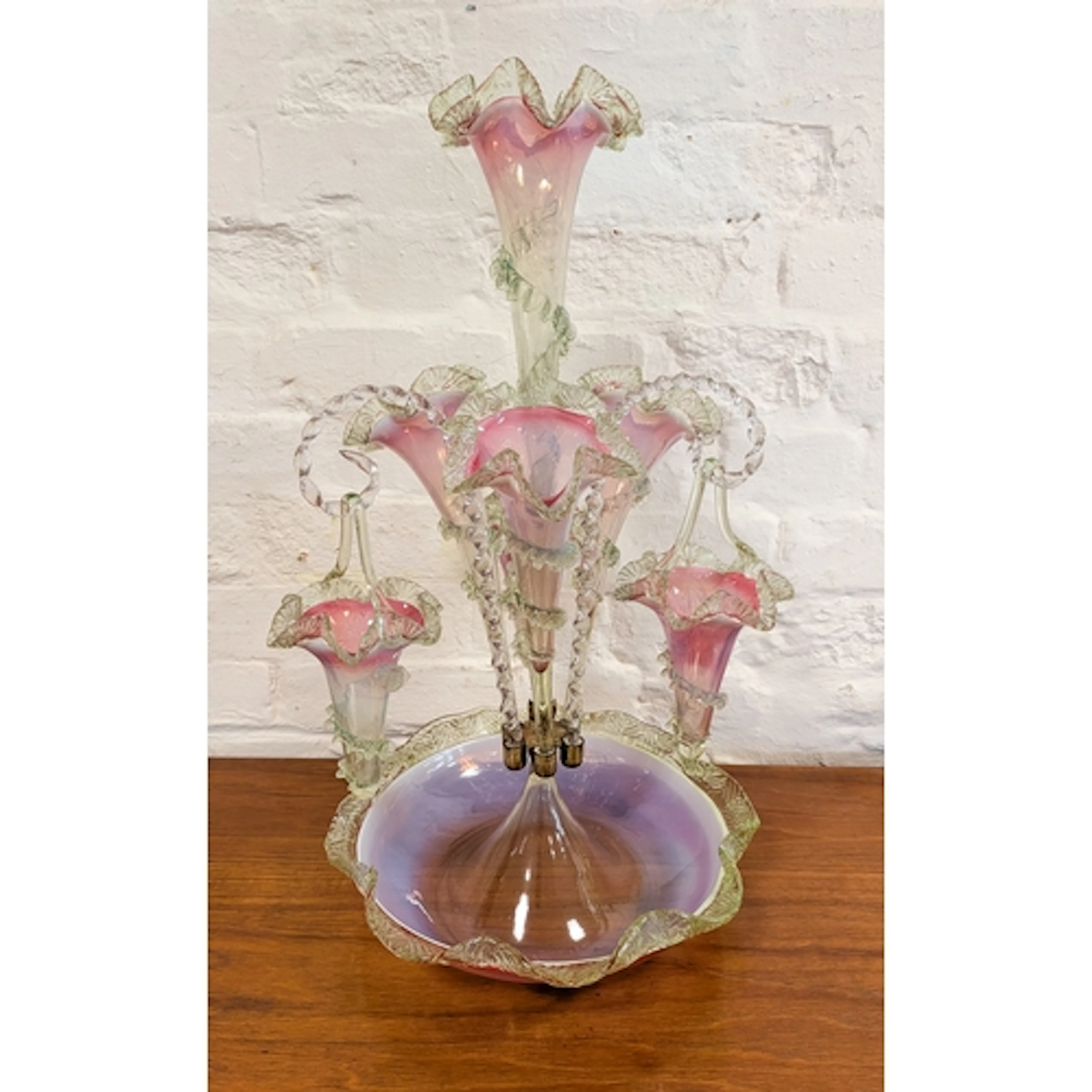 A Victorian pink and green glass epergne with vases and hang...