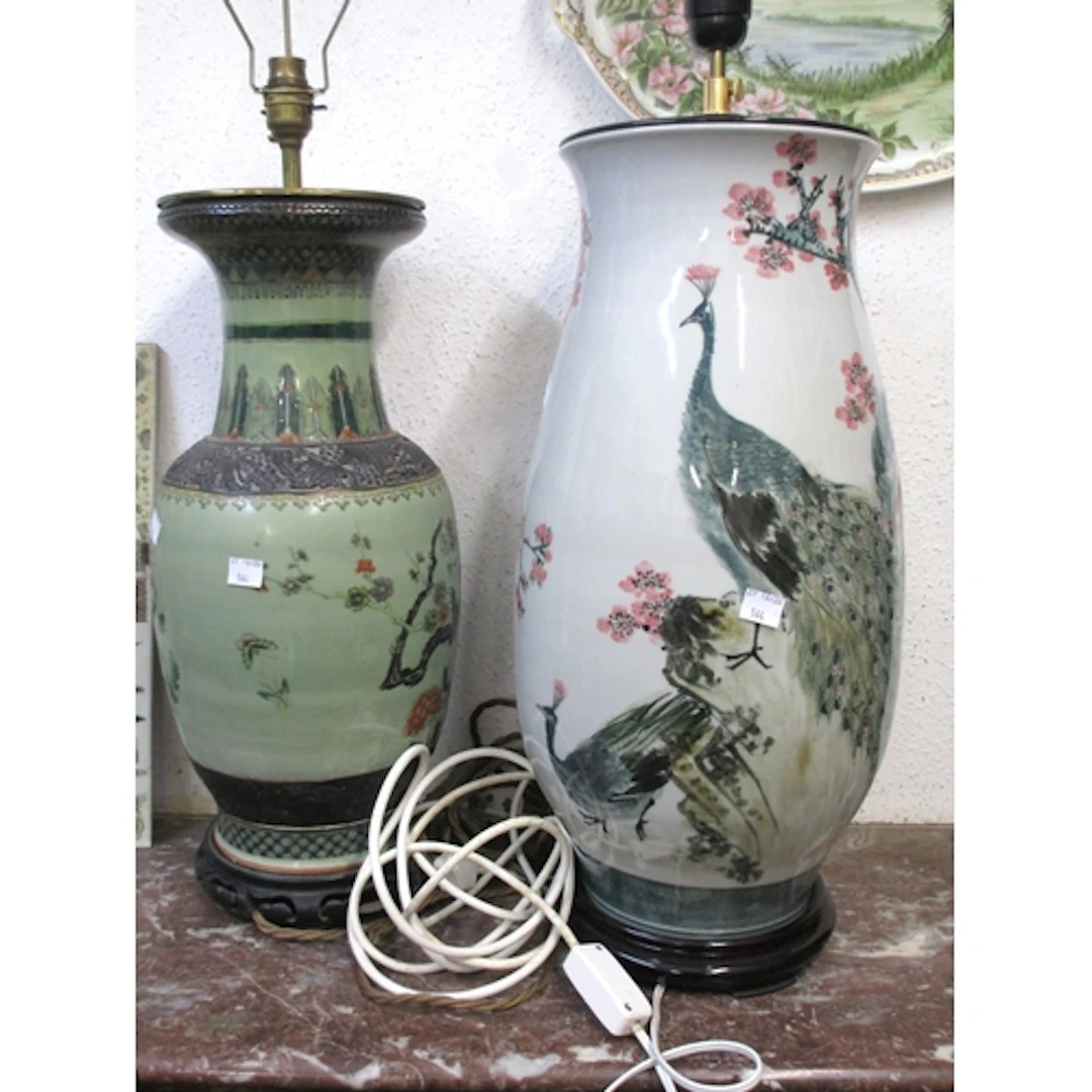 Three various oriental porcelain vases adapted for use as ta...