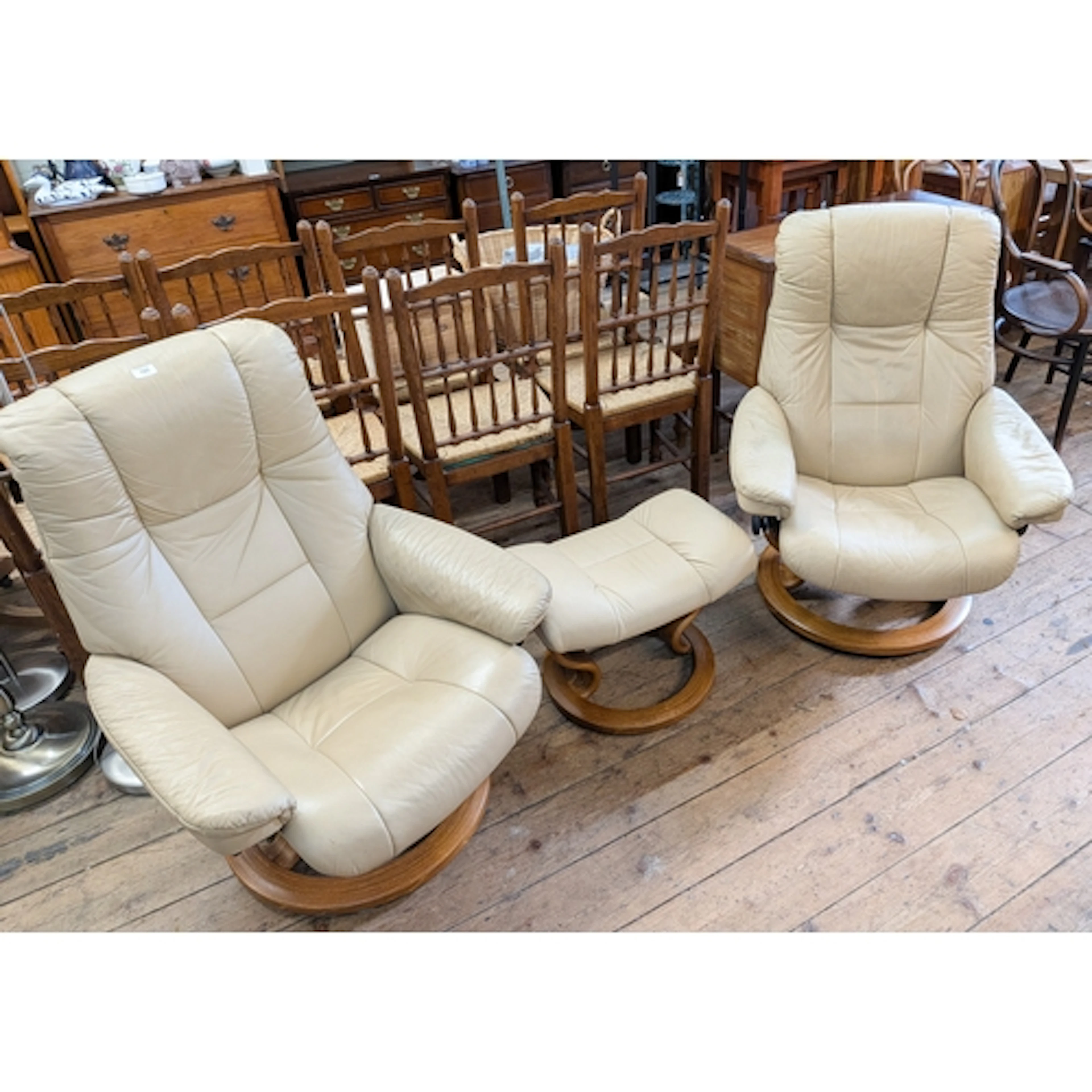 A pair of Ekornes stressless easy chairs, upholstered in a c...