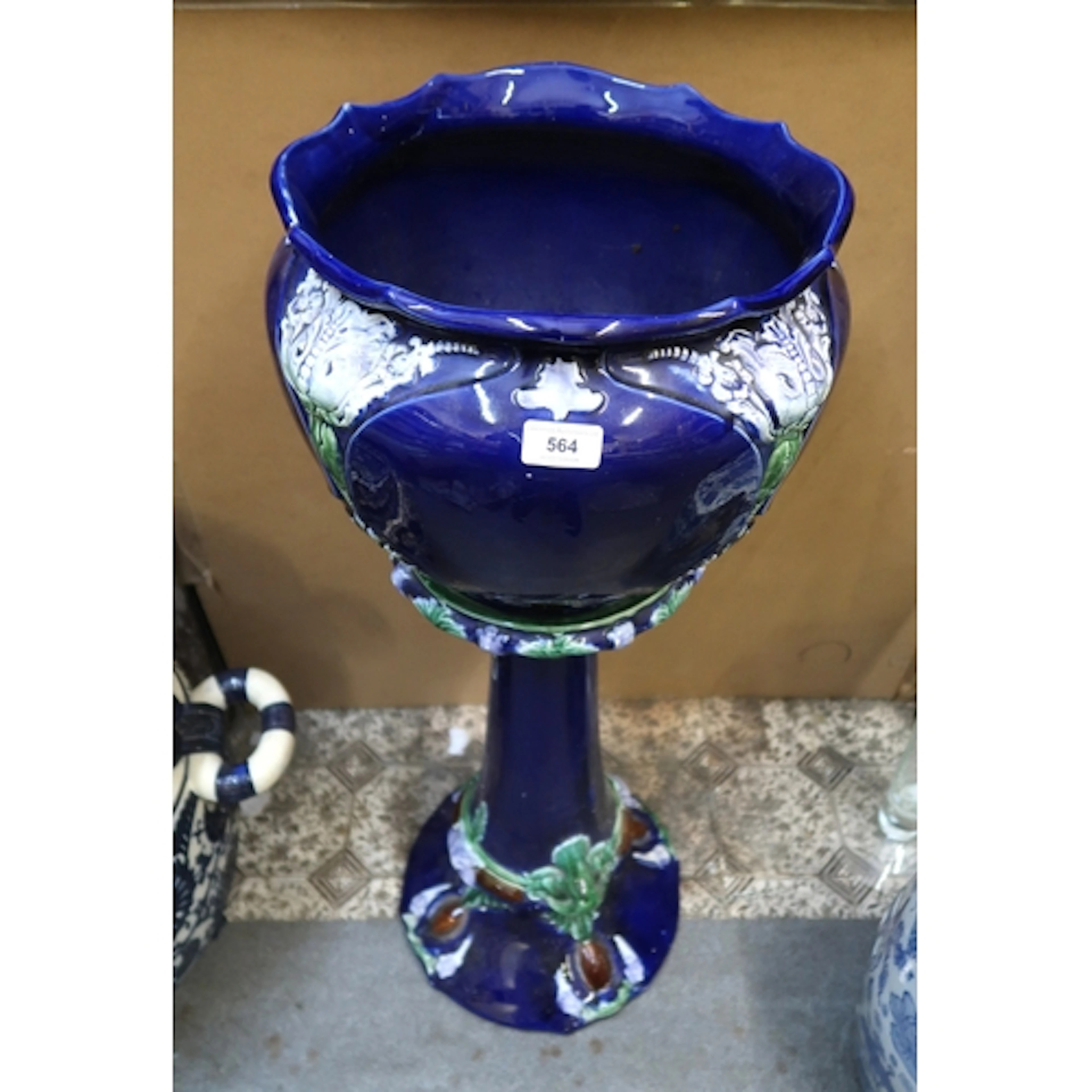 Roosevelt Pottery jardinière on stand with relief moulded de...