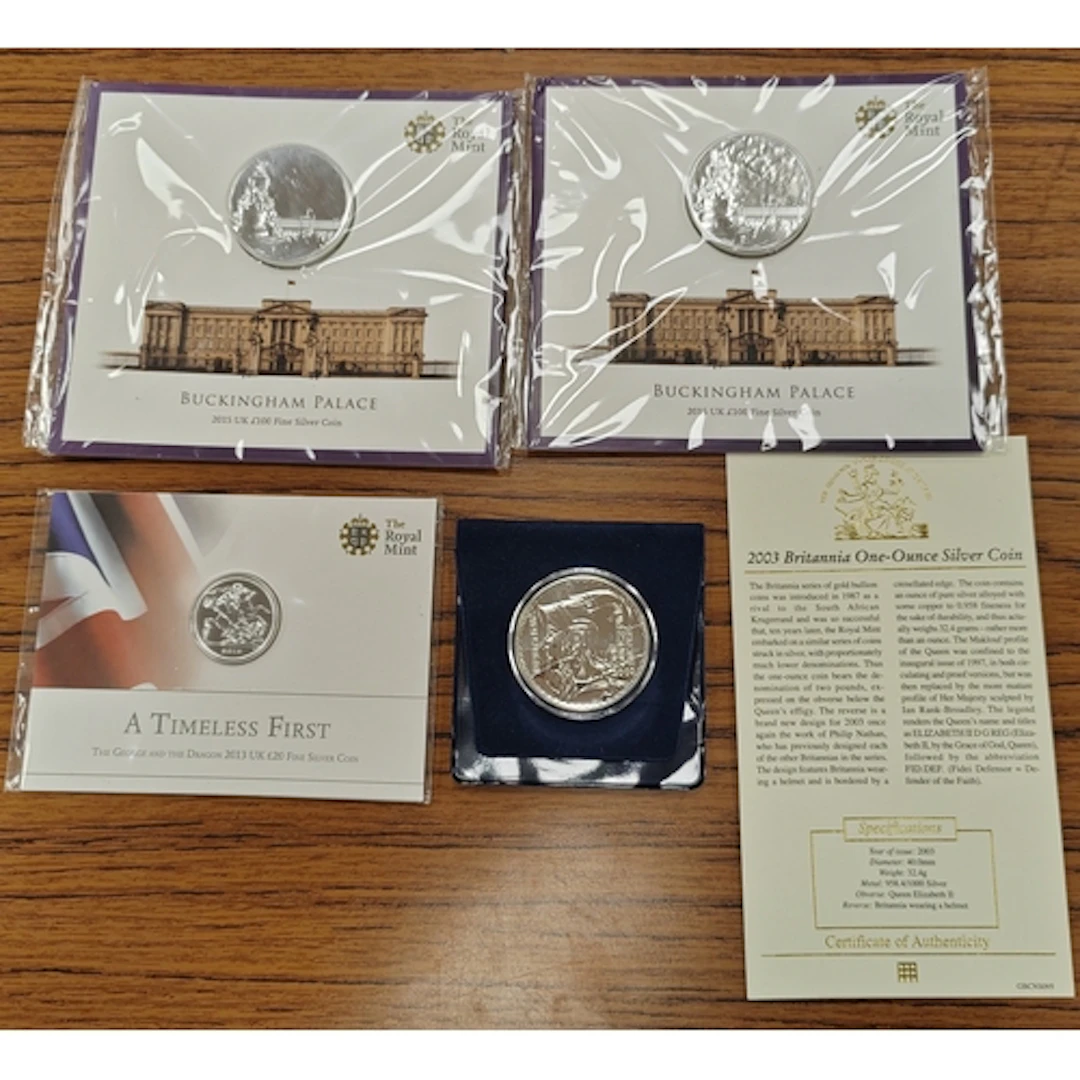 Range of uncirculated on card silver coins, includes 2013 £2...