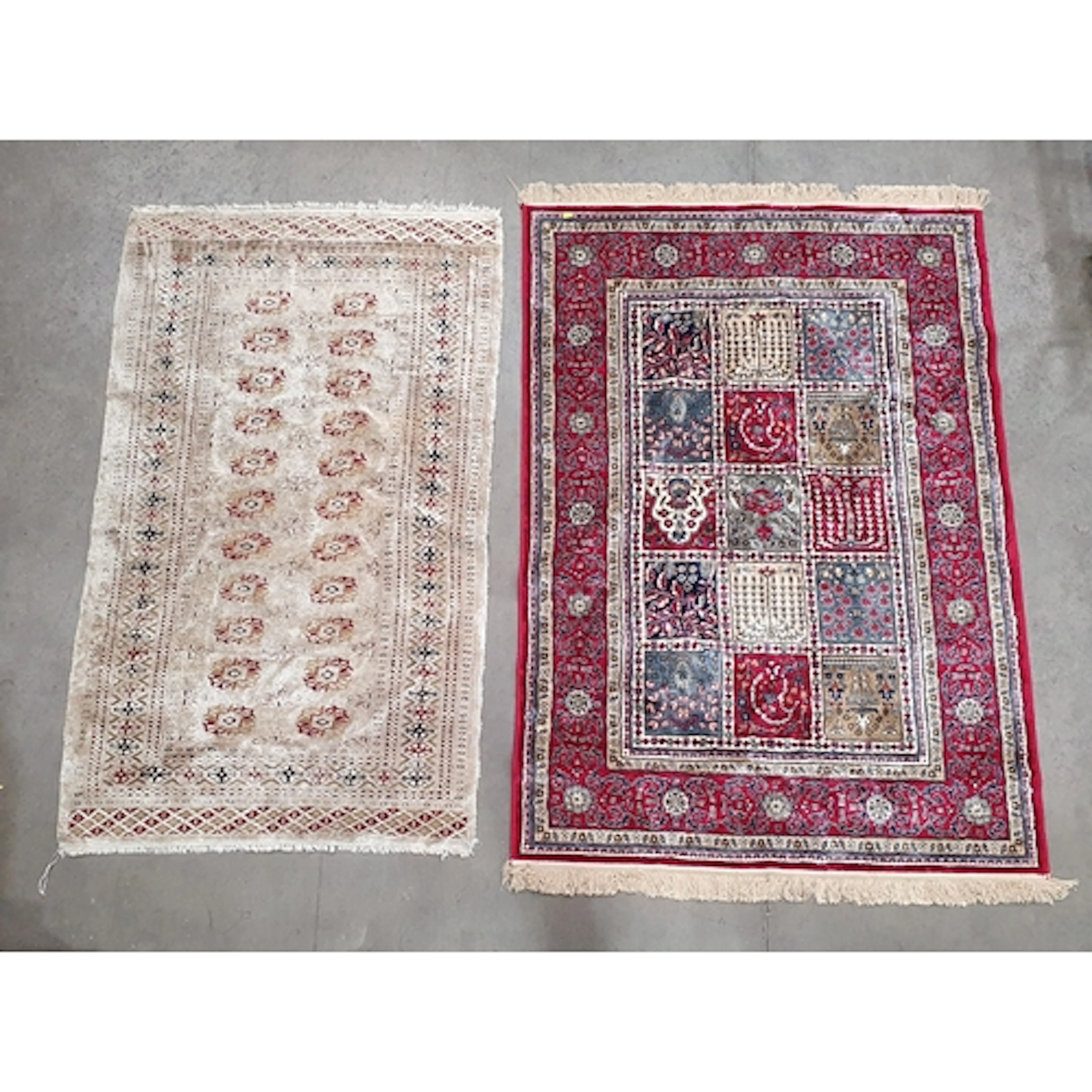 A modern red ground Rug with multi floral borders the centre...