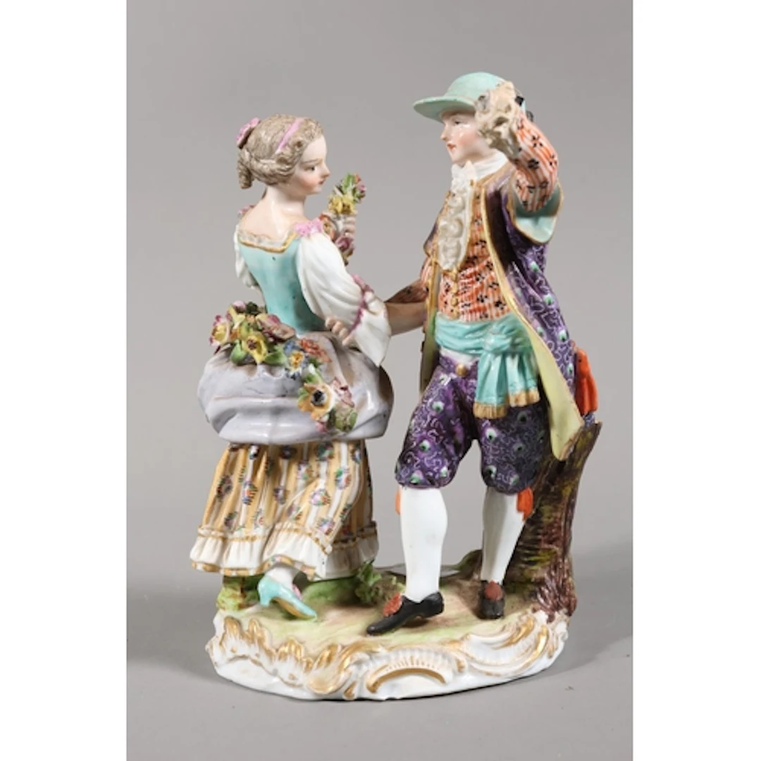Meissen figure group of a couple dancing with garlands. (a/...