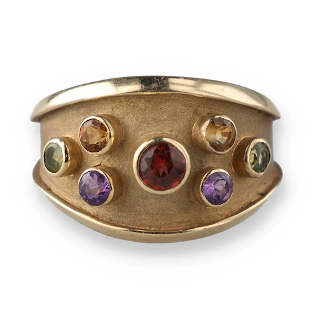 A 9CT GOLD MULTI-STONE RING