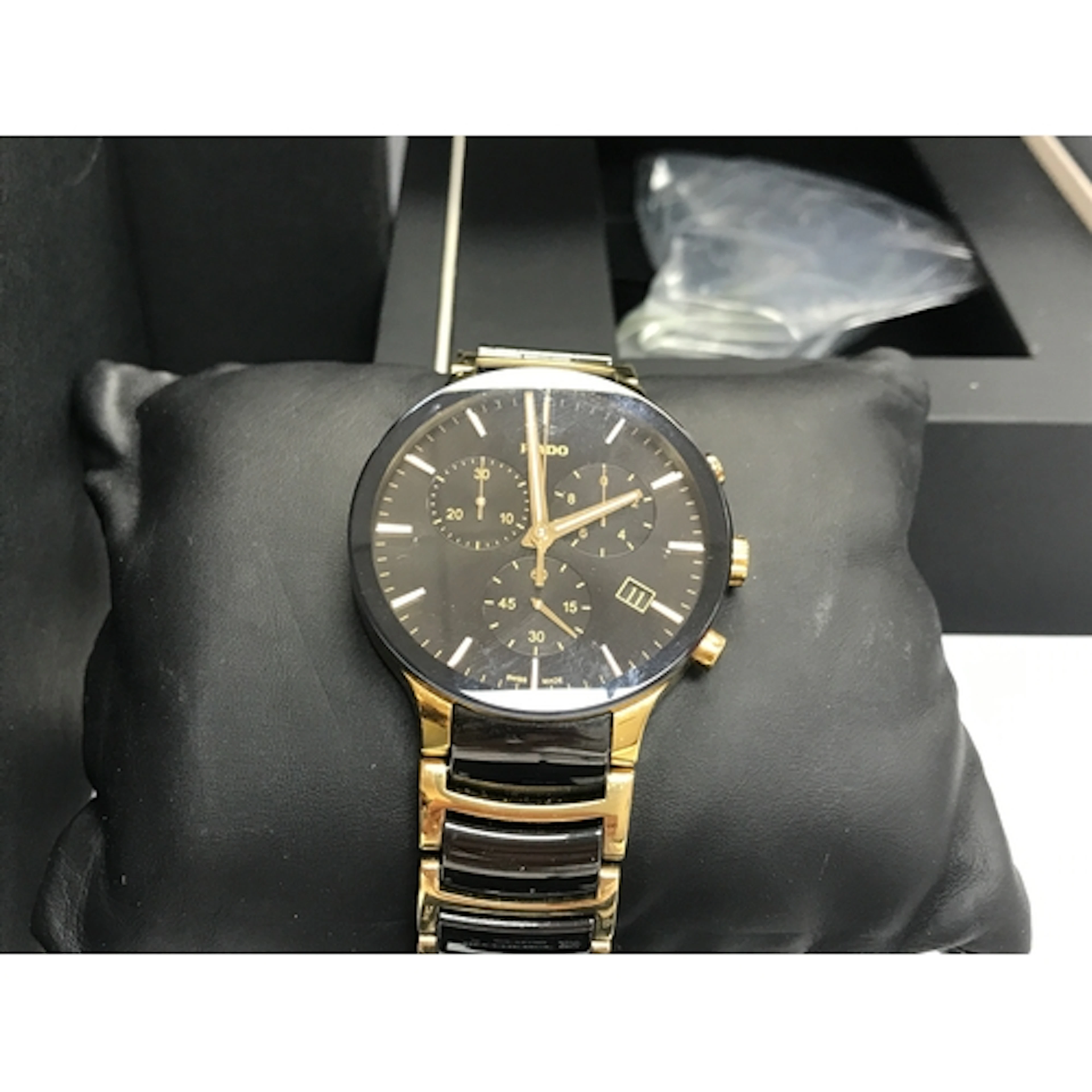 Rado Centrix Chronograph watch featuring a striking black di...
