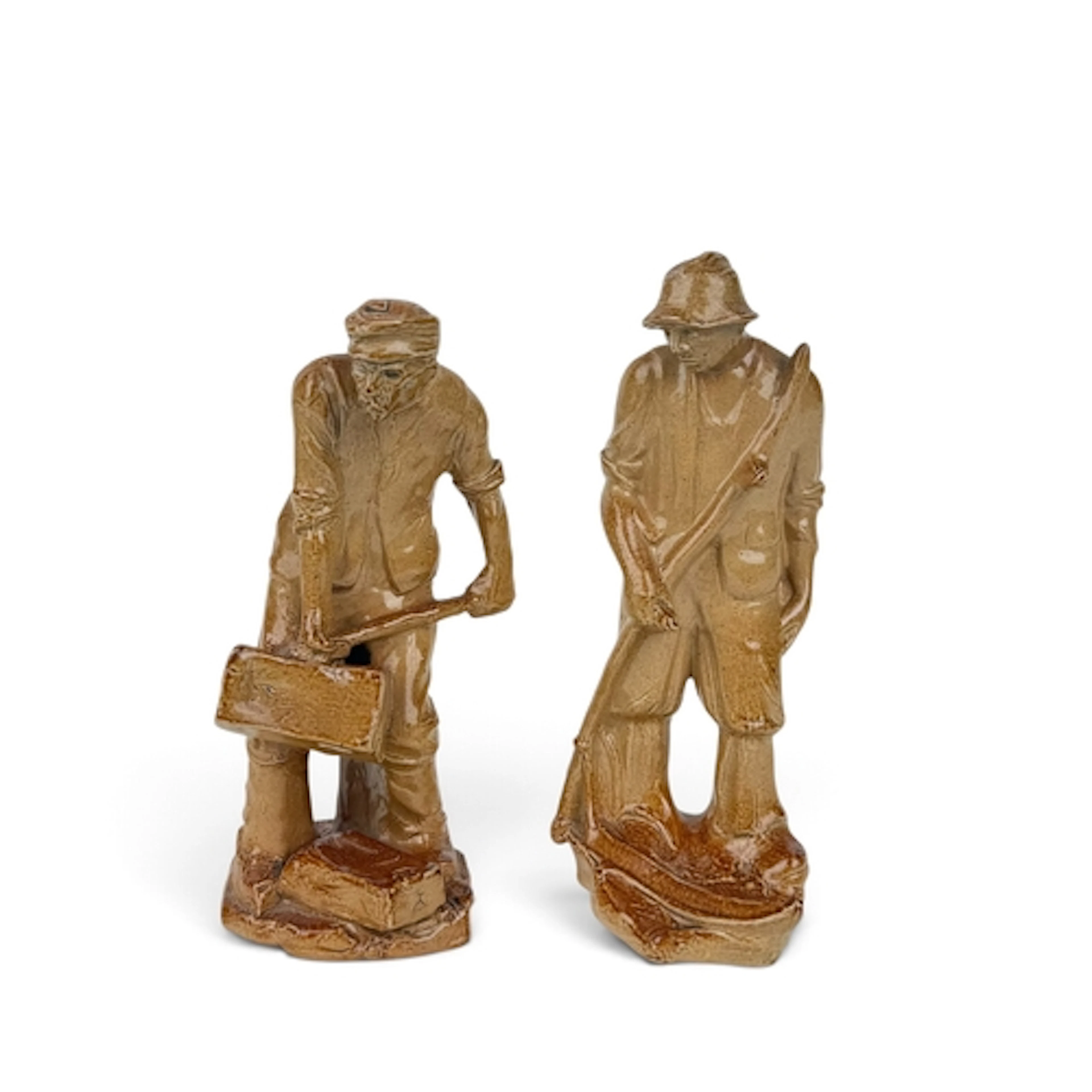 A PAIR OF DOULTON LAMBETH SALT-GLAZED STONEWARE FIGURES BY L...