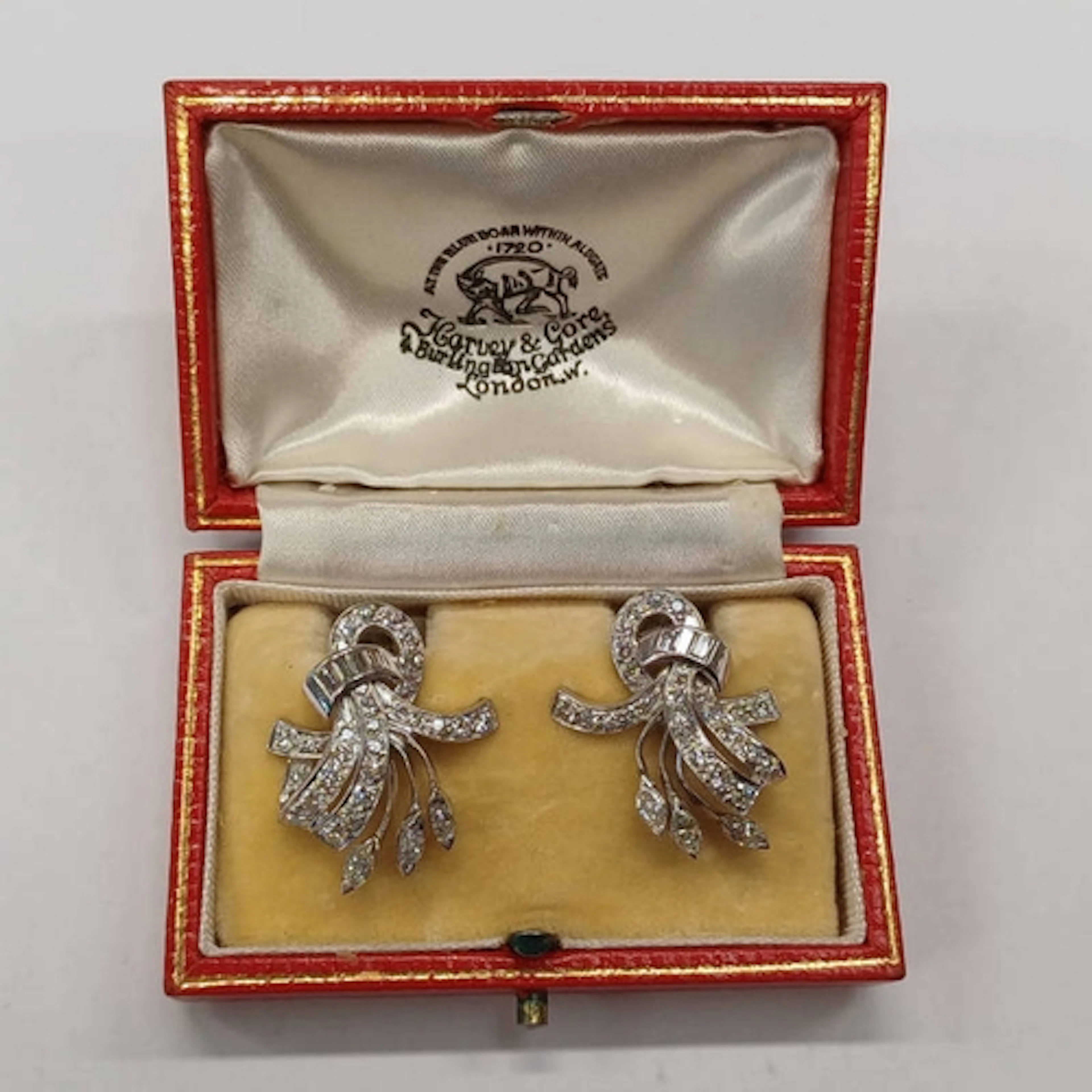 PAIR OF PLATINUM & PALLADIUM DIAMOND SET FLORAL SCROLL EARRI...