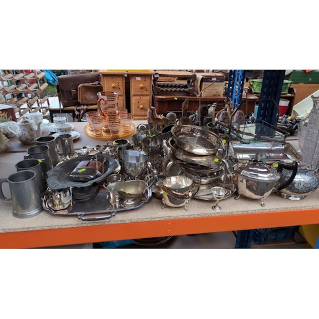 A quantity of silver-plated and pewter tableware, including ...