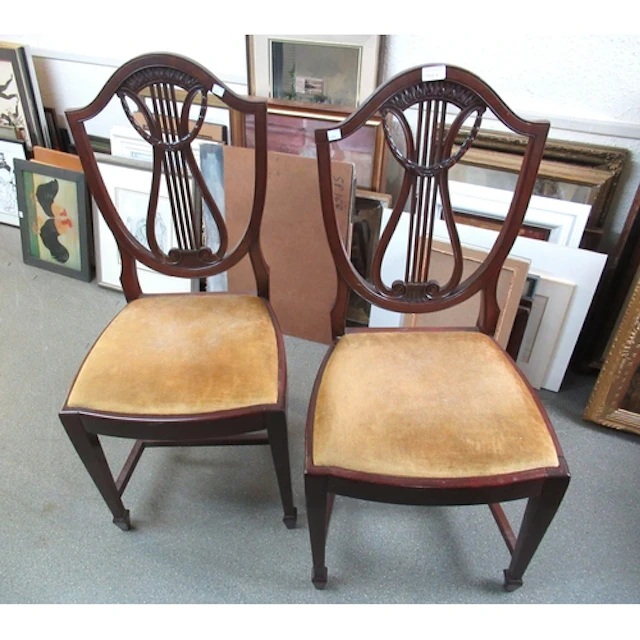 Set of six Edwardian mahogany shield back dining chairs