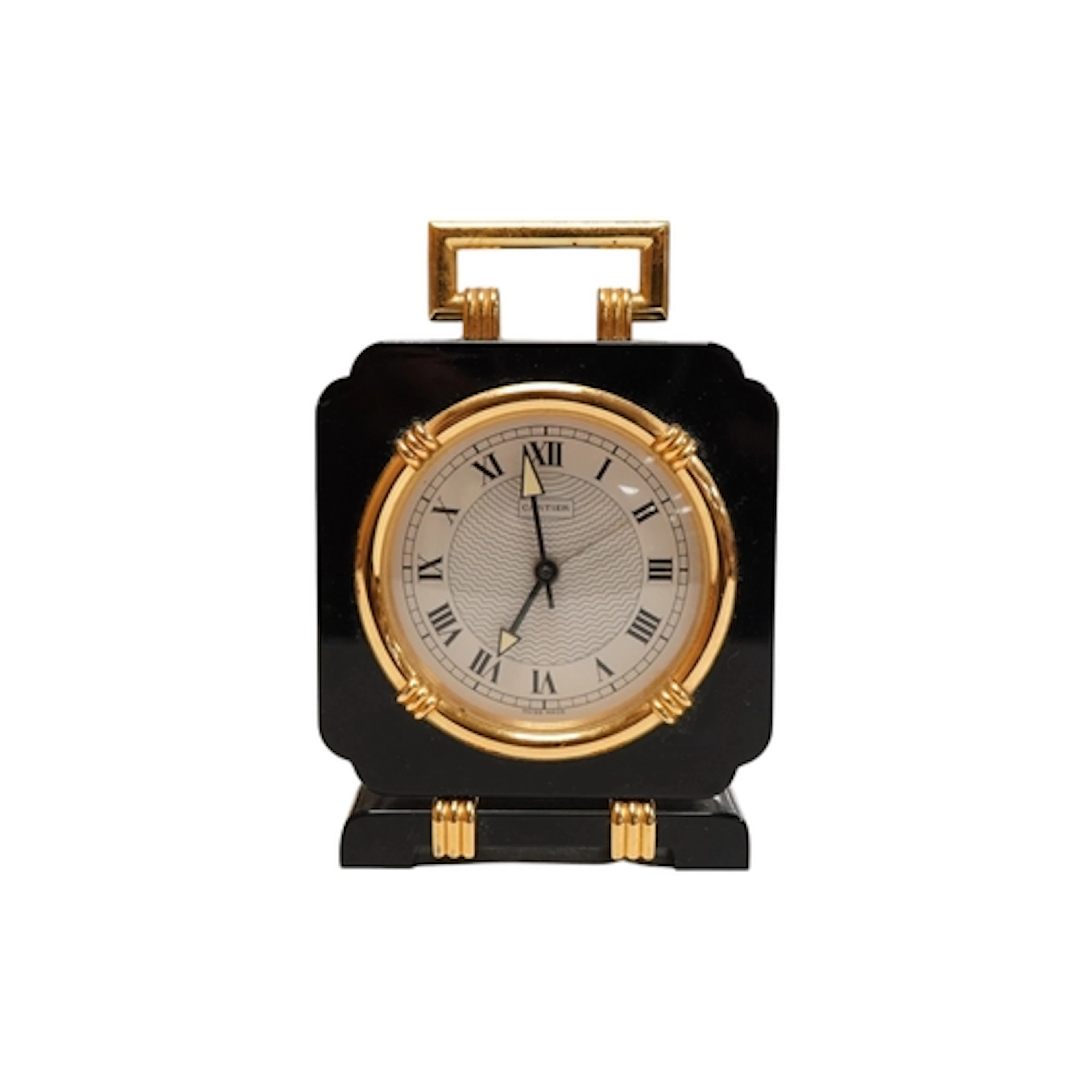 A boxed Must de Cartier black onyx clock, 90170034, with cas...