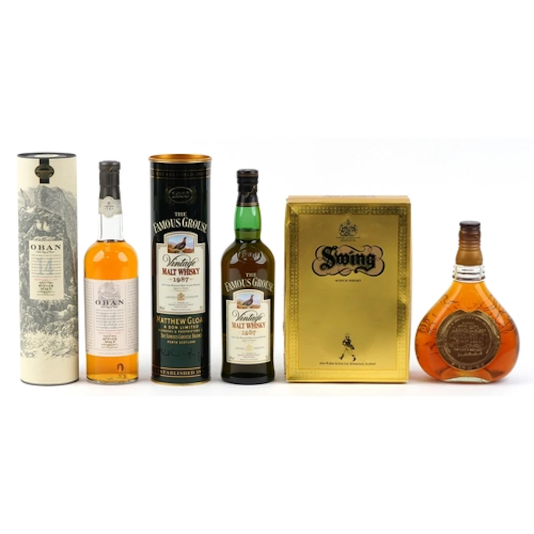Three bottles of whisky comprising Oban Single Malt Scotch w...