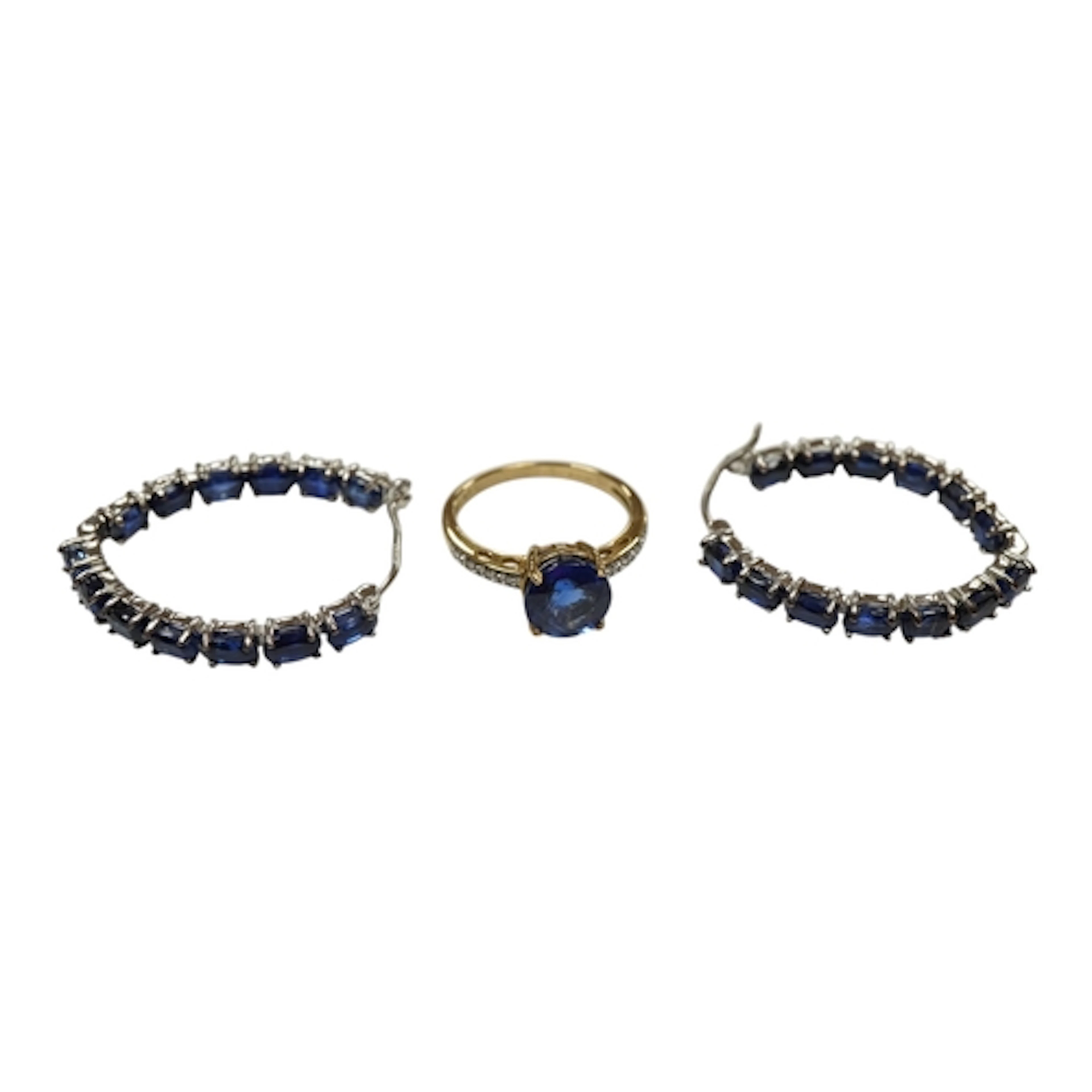 A recent 9ct gold and single stone round cut kyanite ring, w...