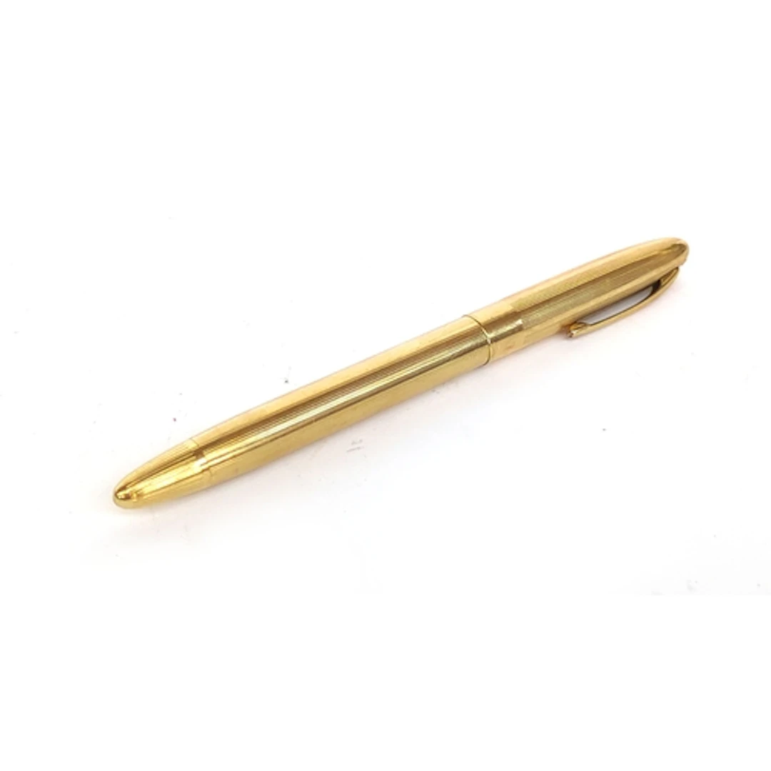 A gilt Sheaffer's fountain pen with 14ct nib