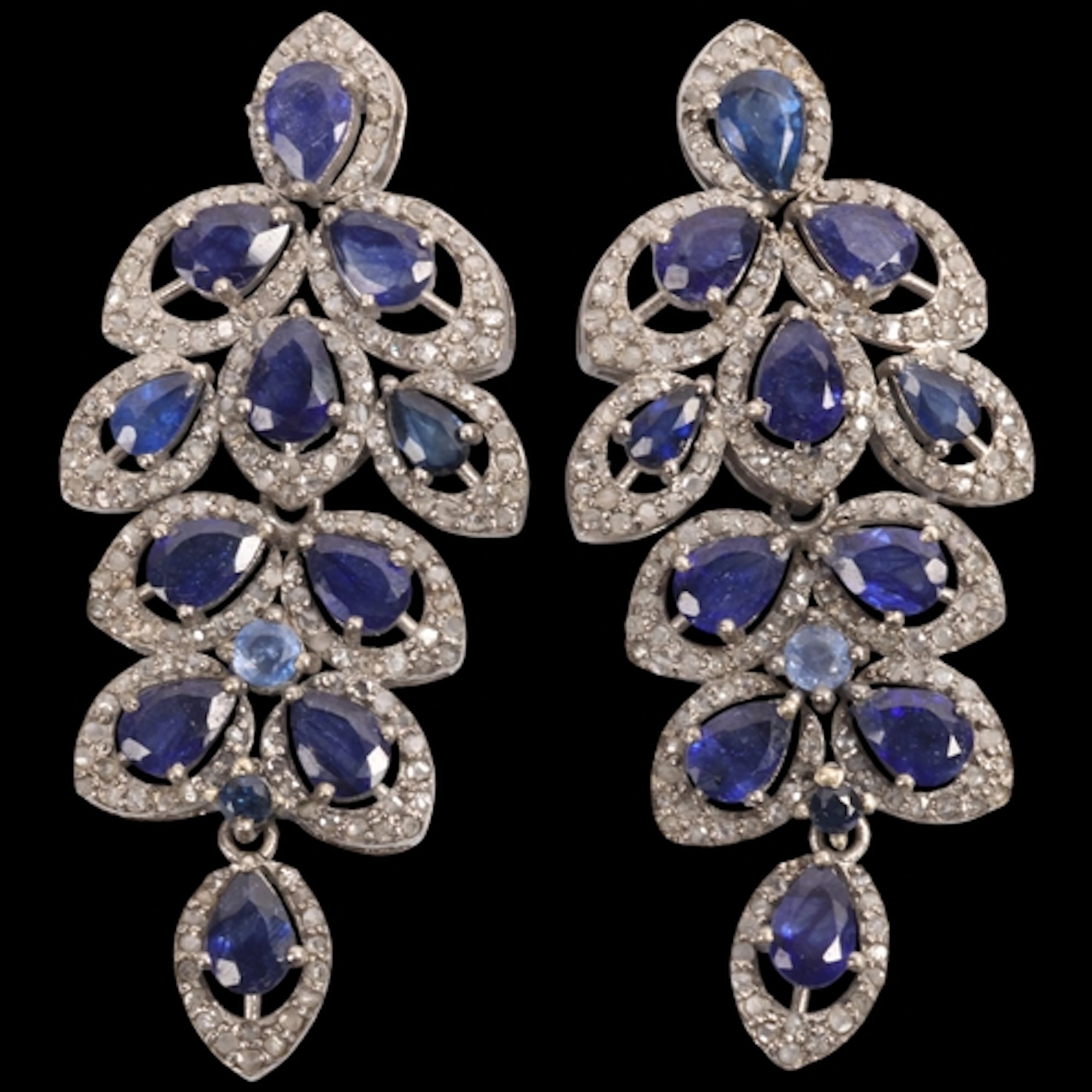 A pair of silver kyanite and diamond stud earrings, articula...
