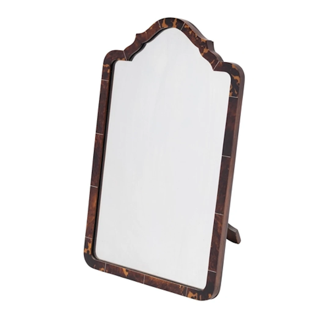 A tortoiseshell veneered and ivory banded dressing table mir...