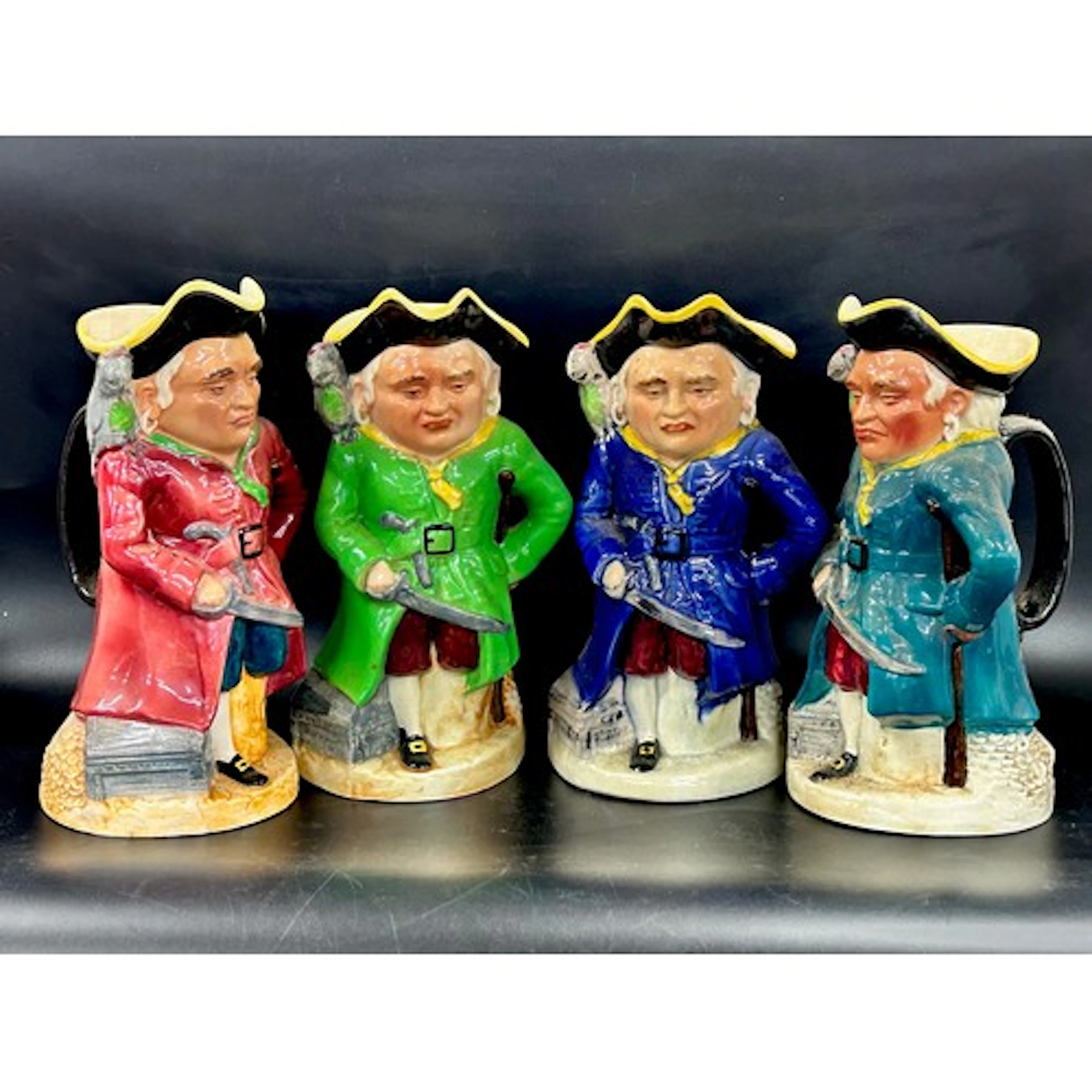 Eight large Toby character jugs including Burlington Ware an...