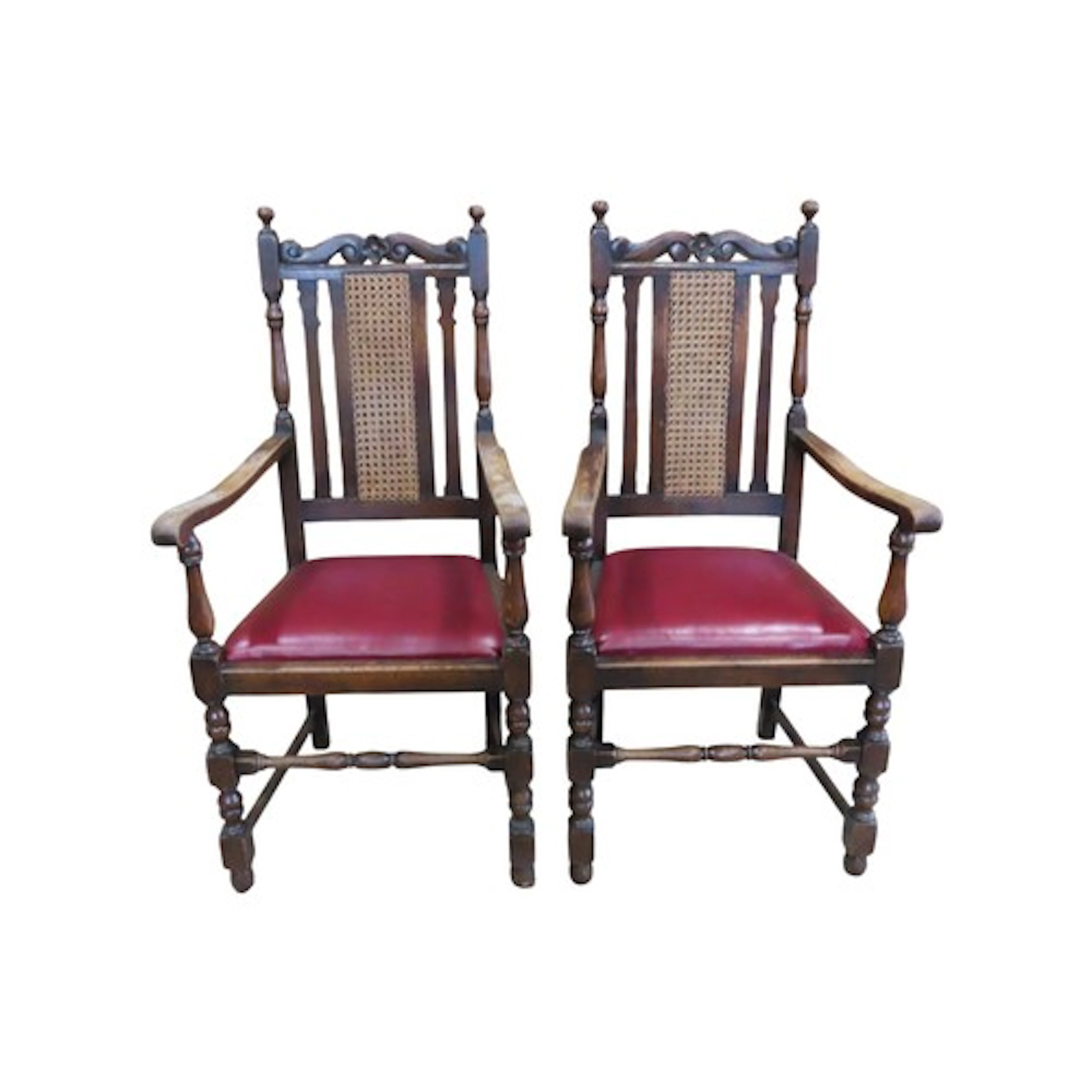 A pair of oak armchairs in a Carolean manner.